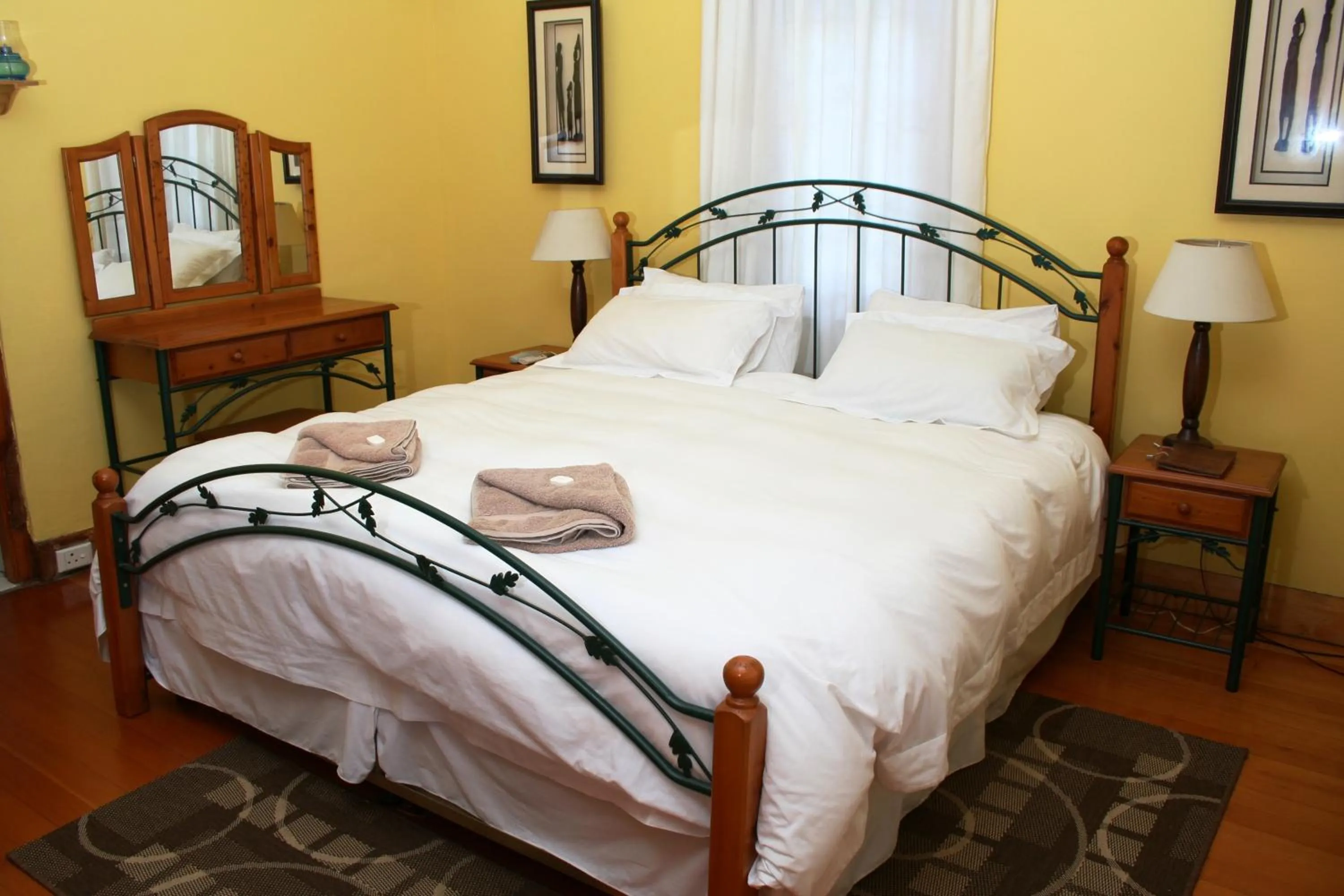 Bed in Flintstones Guest House Durban