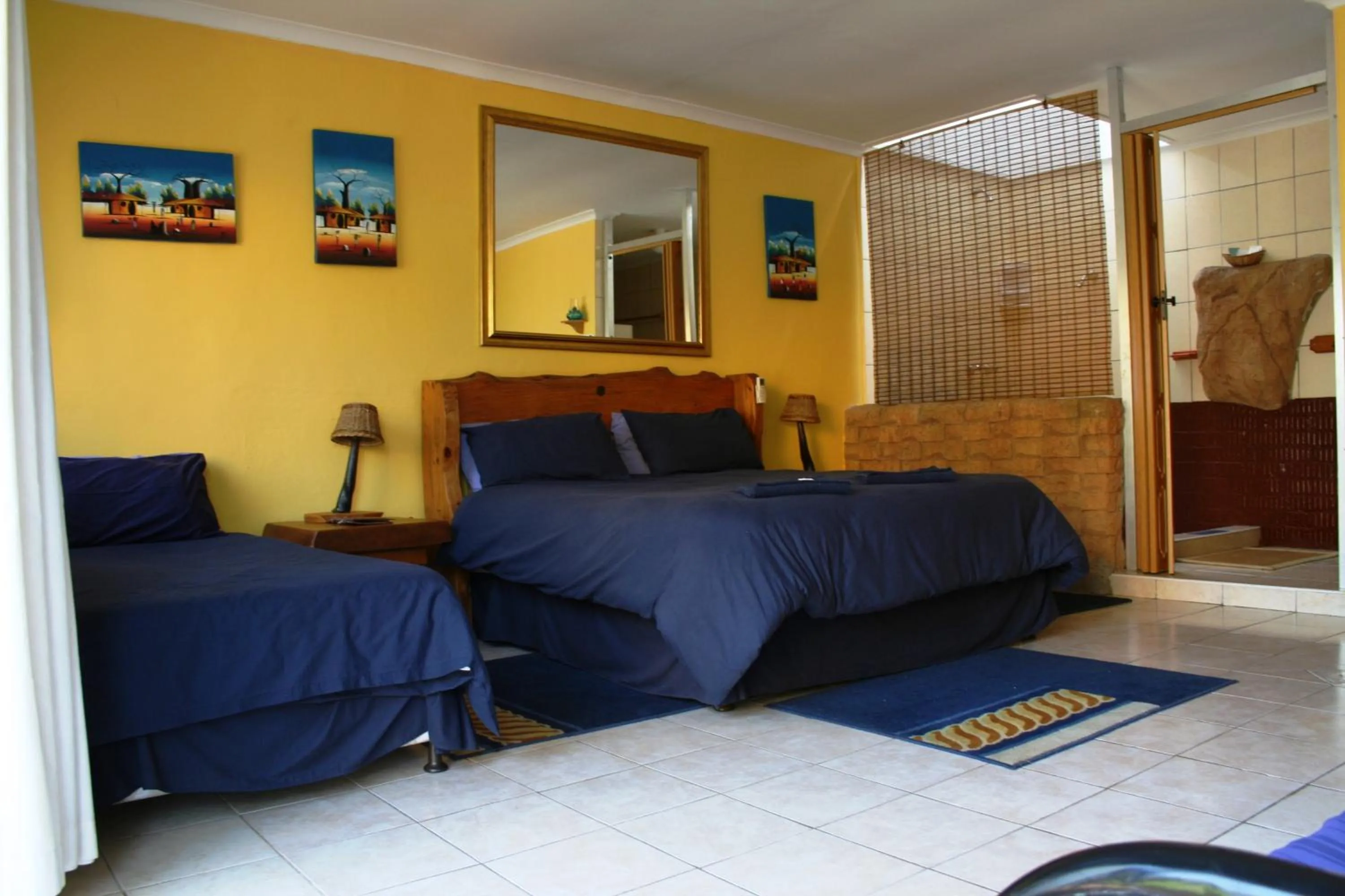 Bed in Flintstones Guest House Durban