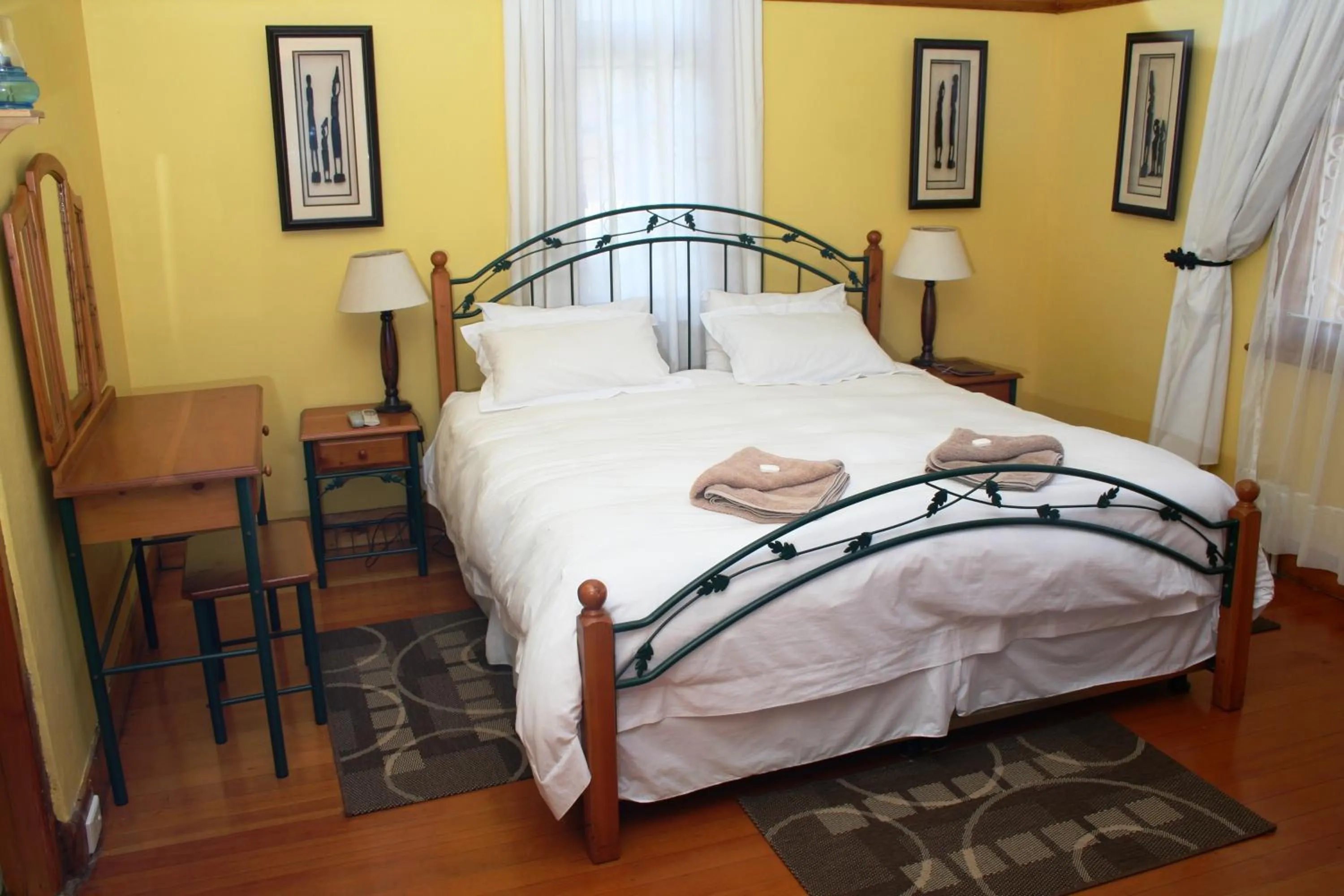 Bed in Flintstones Guest House Durban