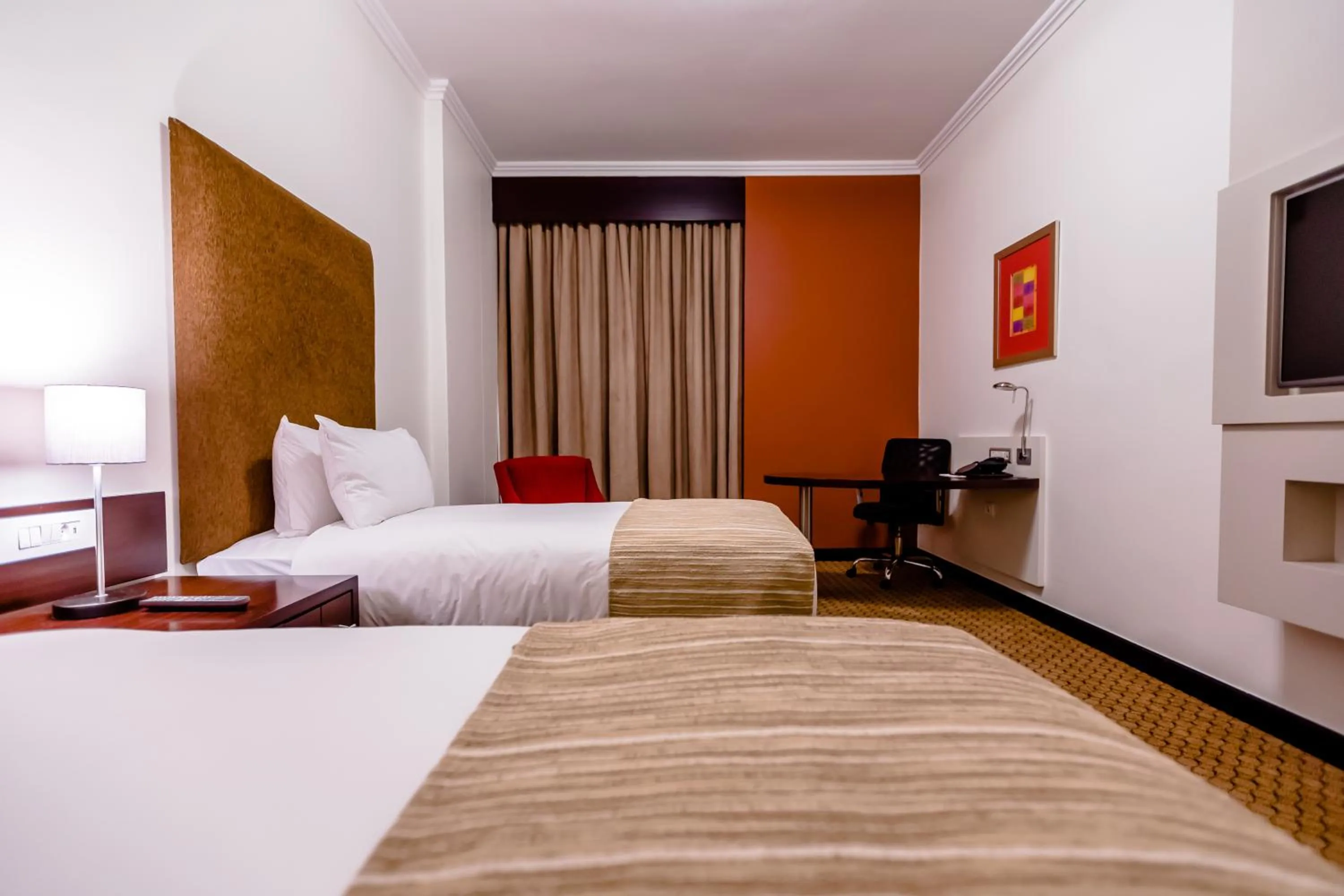 Bed in Holiday Inn Sandton, an IHG Hotel