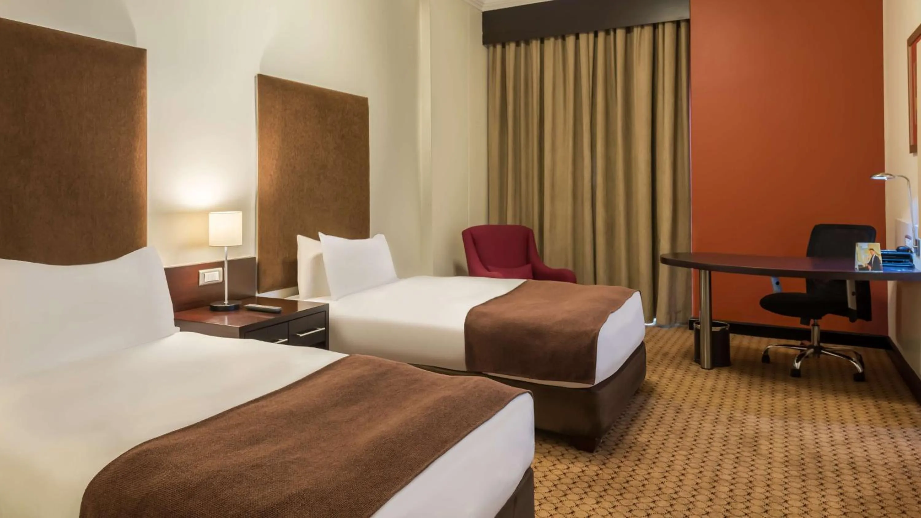 Bedroom, Bed in Holiday Inn Sandton, an IHG Hotel