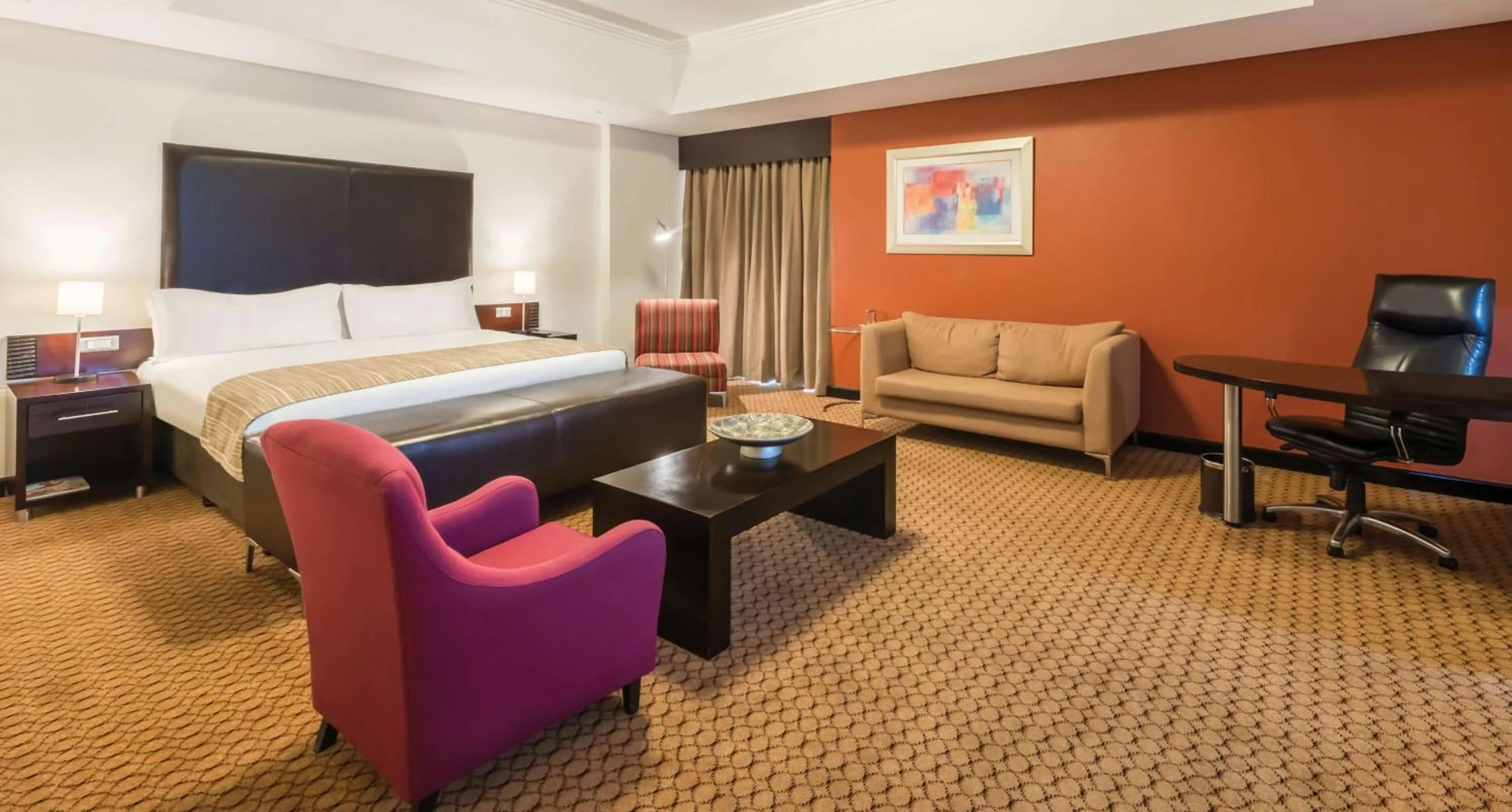 Bedroom, Bed in Holiday Inn Sandton, an IHG Hotel