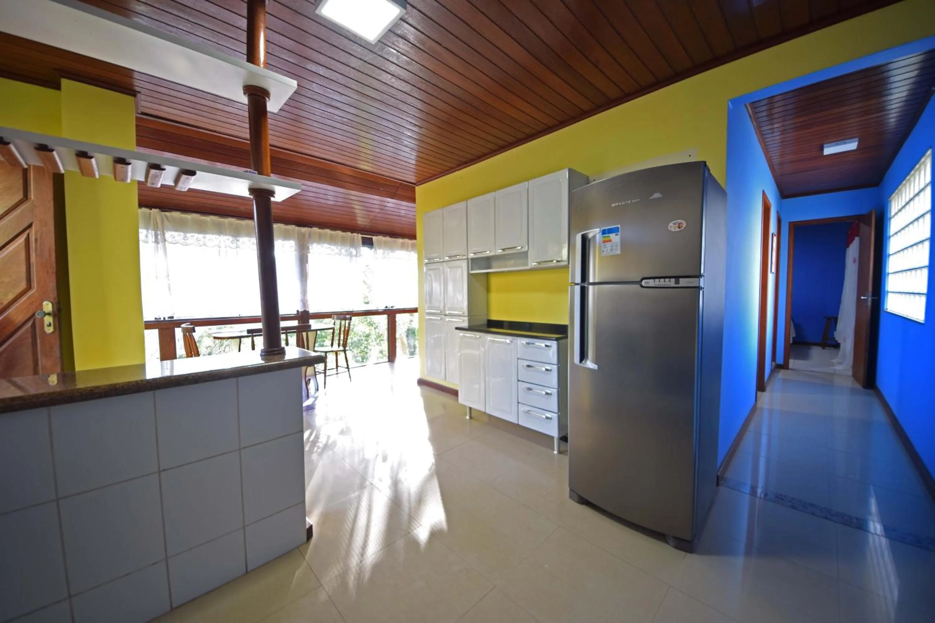 Kitchen or kitchenette in Alta Colina Chalés