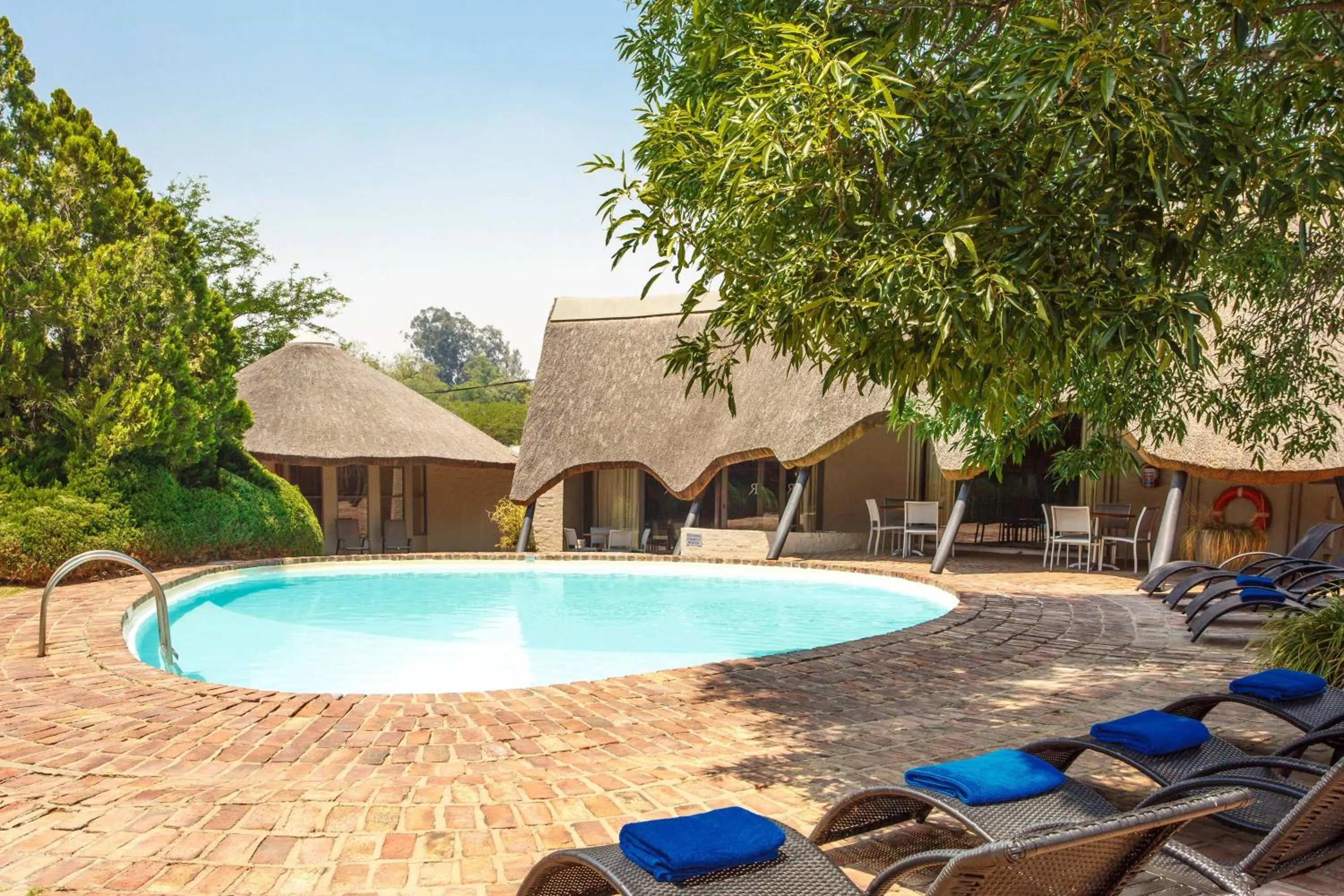 Swimming pool in Protea Hotel by Marriott Oudtshoorn Riempie Estate