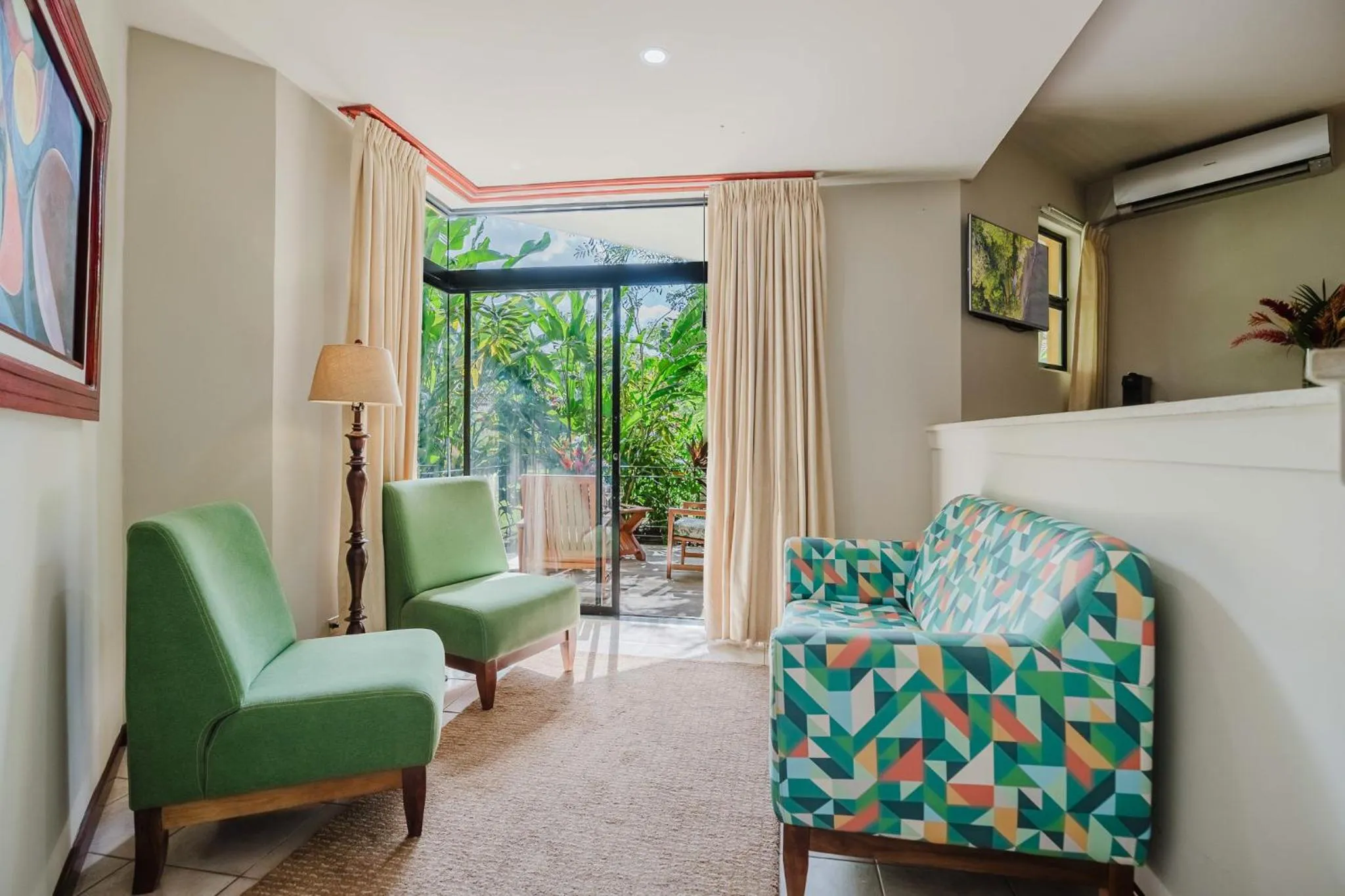 Living room, Bed in Papagayo Golden Palms Beachfront Hotel