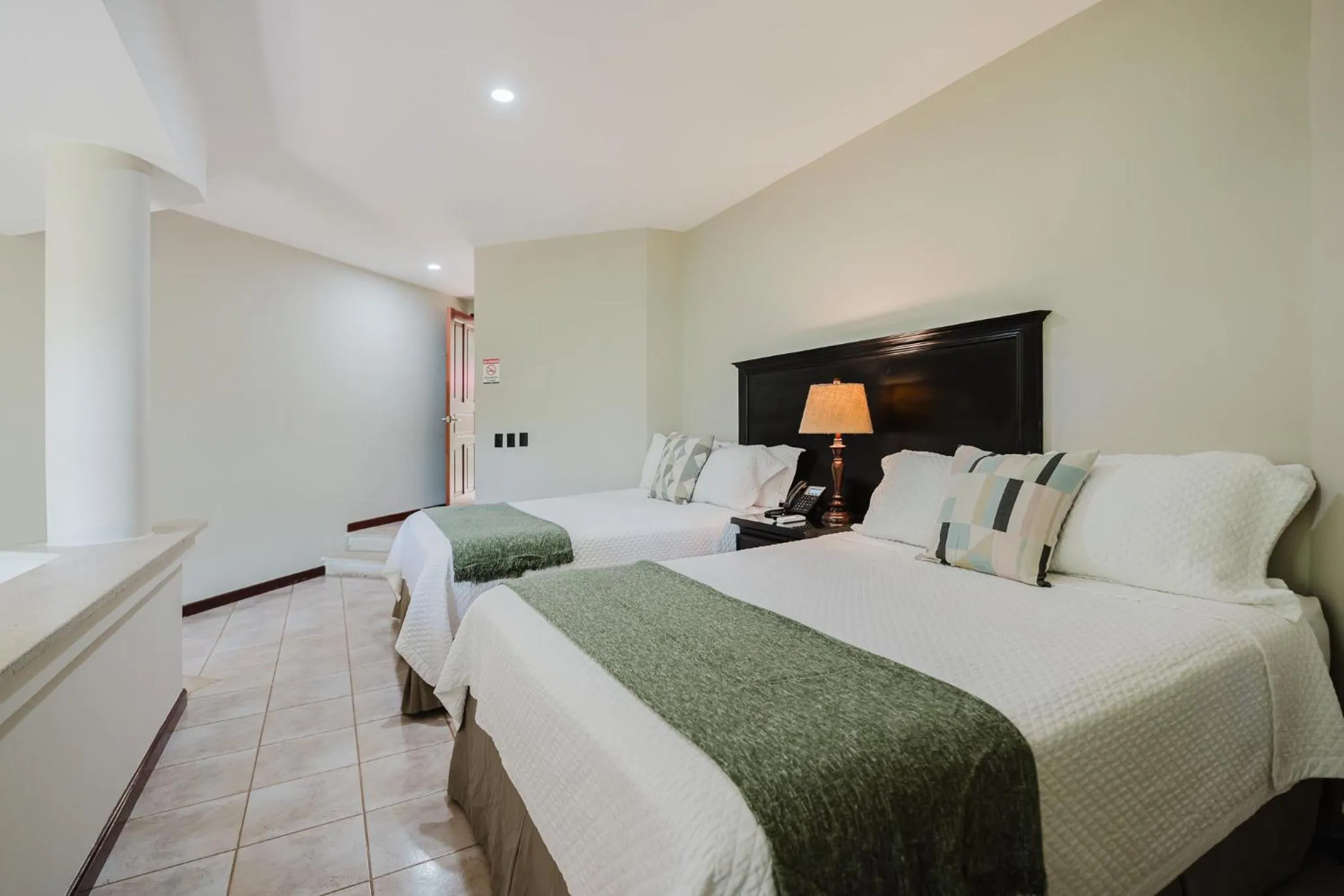 Photo of the whole room, Bed in Papagayo Golden Palms Beachfront Hotel