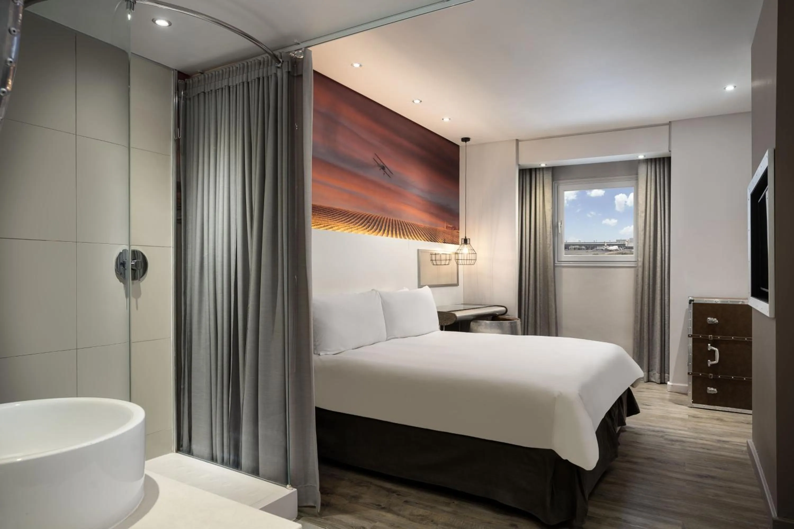 Photo of the whole room, Bed in Protea Hotel by Marriott O R Tambo Airport