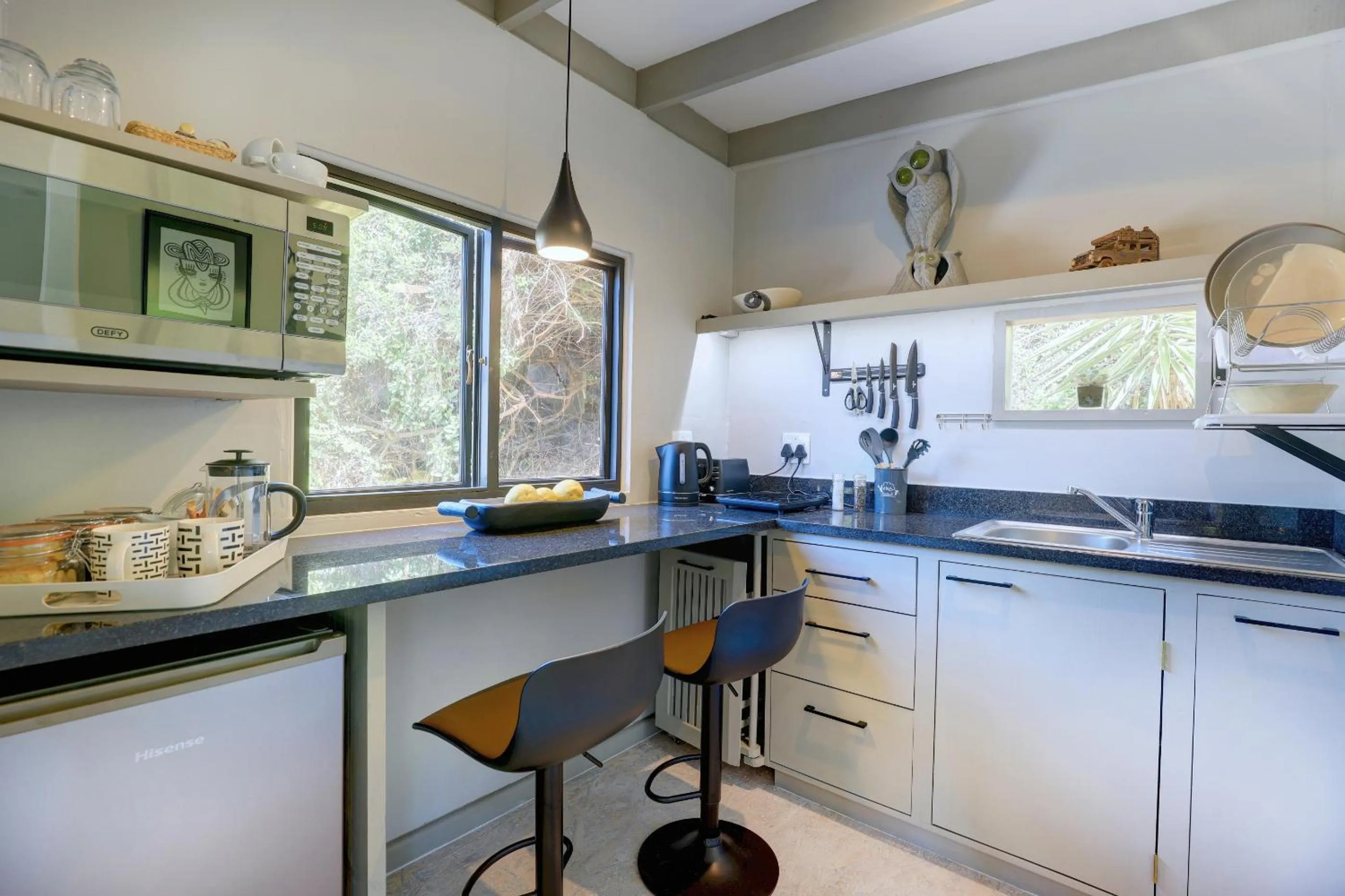 Kitchen or kitchenette in Moontide Riverside Lodge