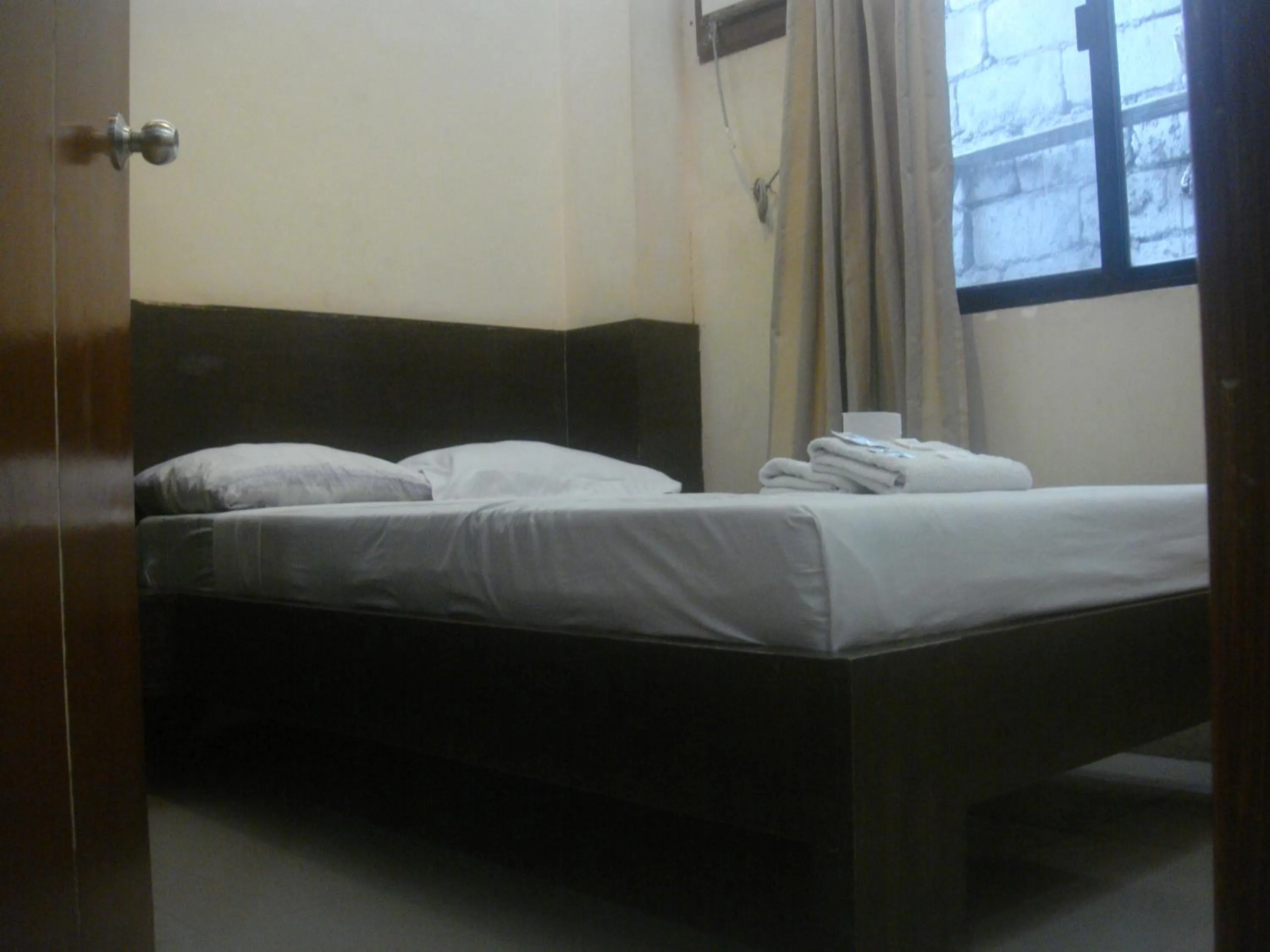 Bed in Hidden Pearl Hotel (Janus Luxury Suites)