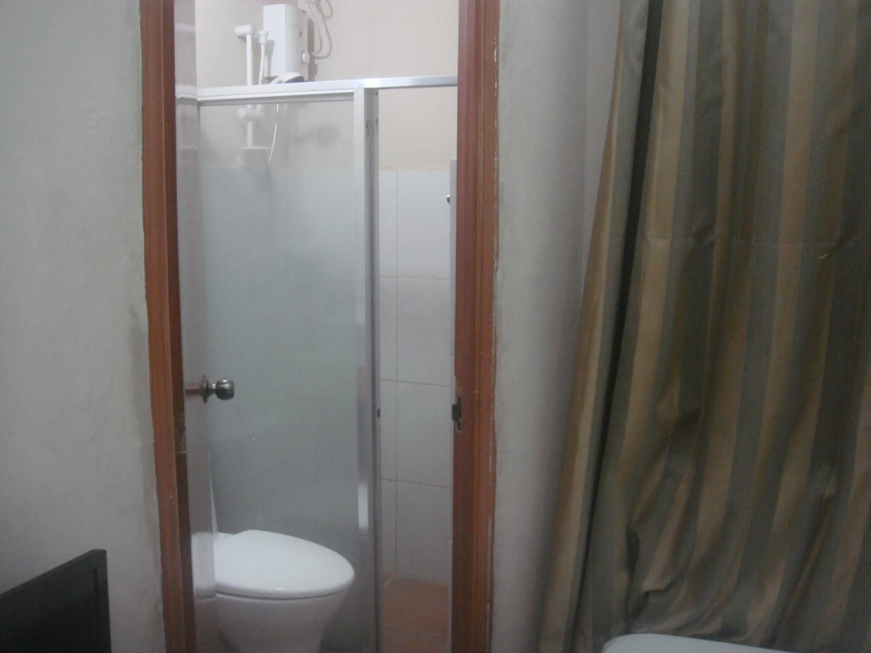 Toilet in Hidden Pearl Hotel (Janus Luxury Suites)