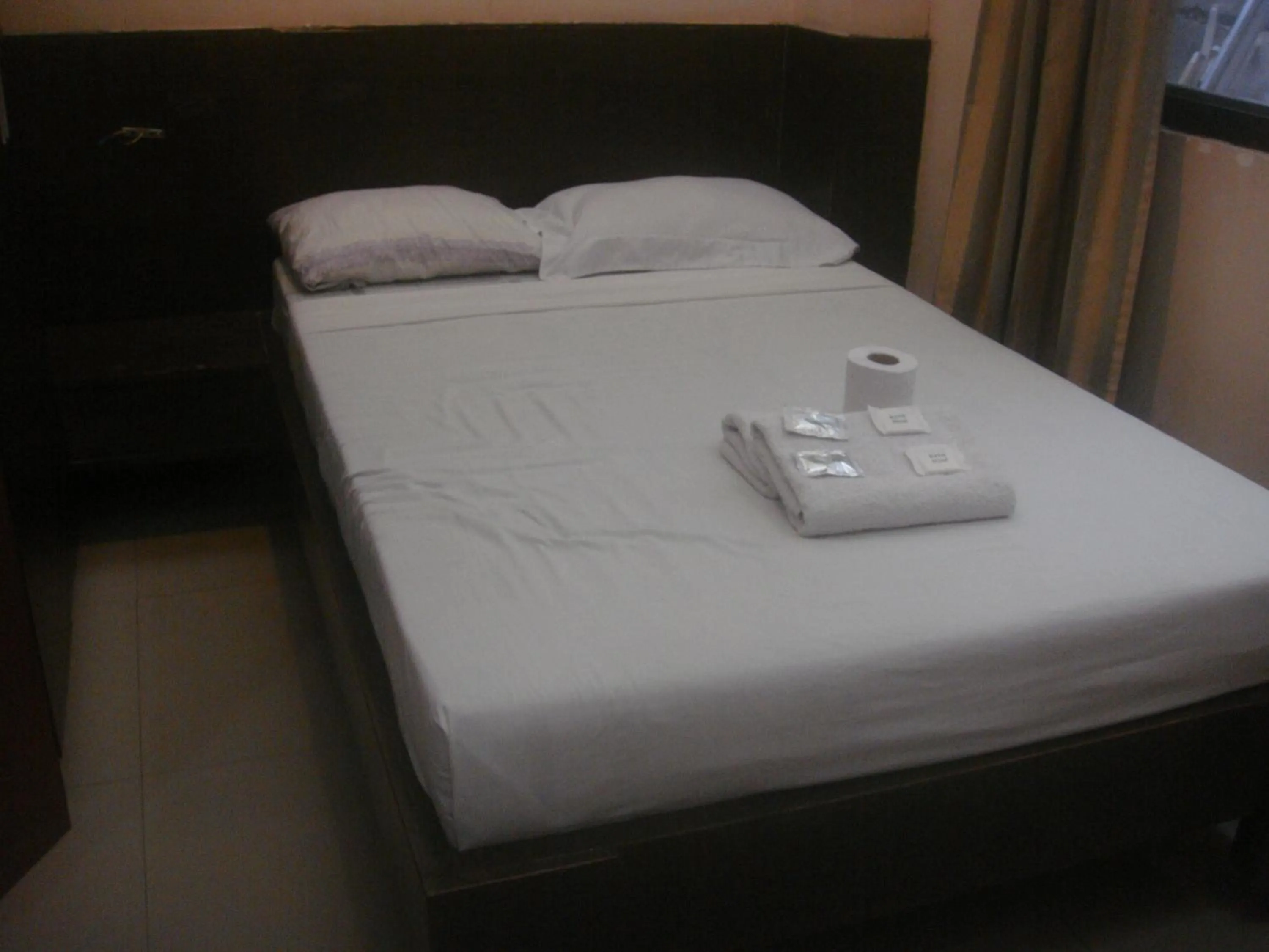Bed in Hidden Pearl Hotel (Janus Luxury Suites)