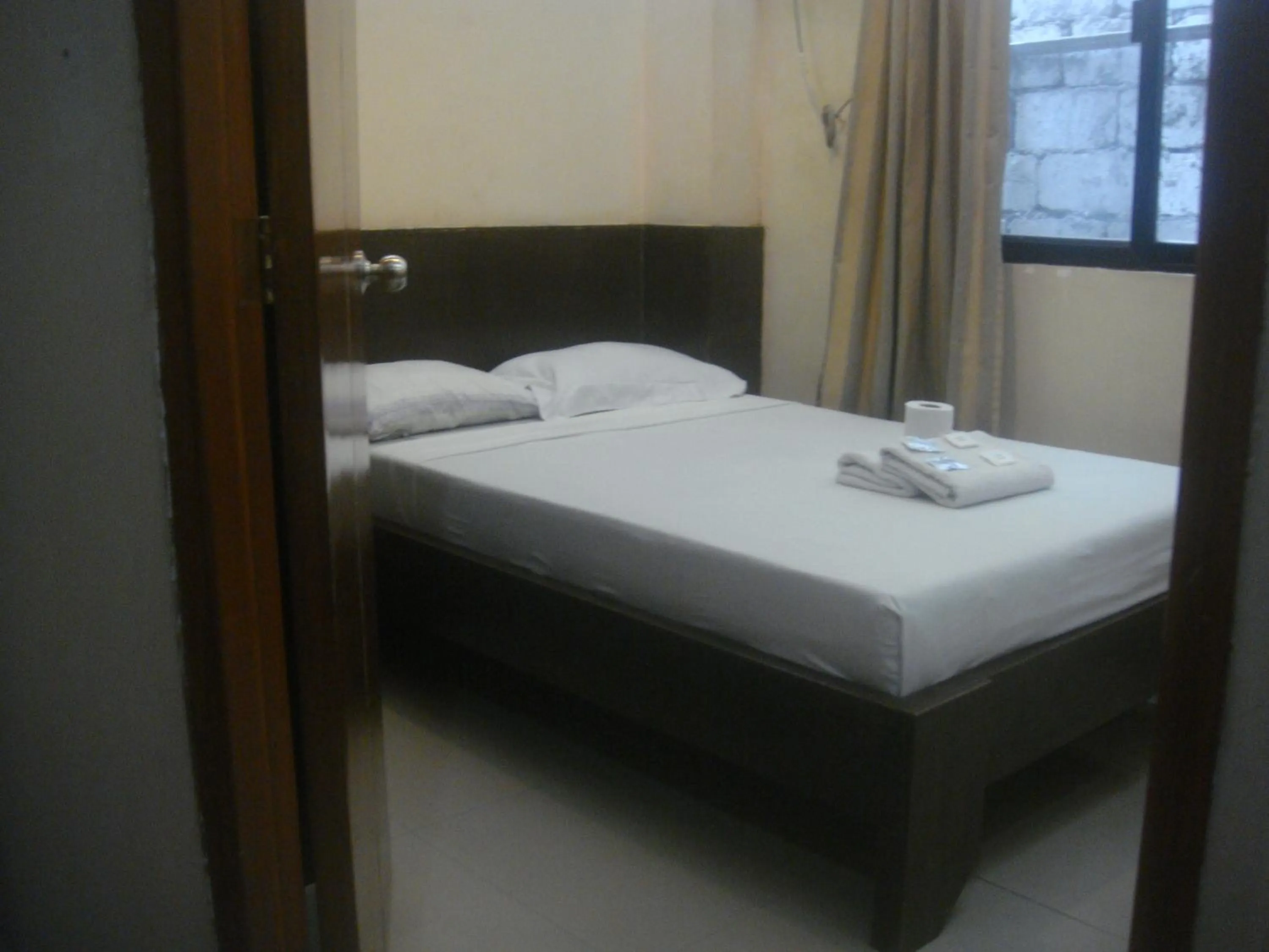 Bed in Hidden Pearl Hotel (Janus Luxury Suites)