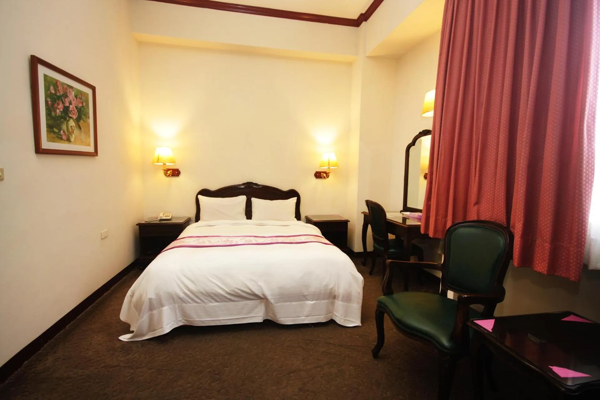 Bed in East Commercial Affairs Hotel