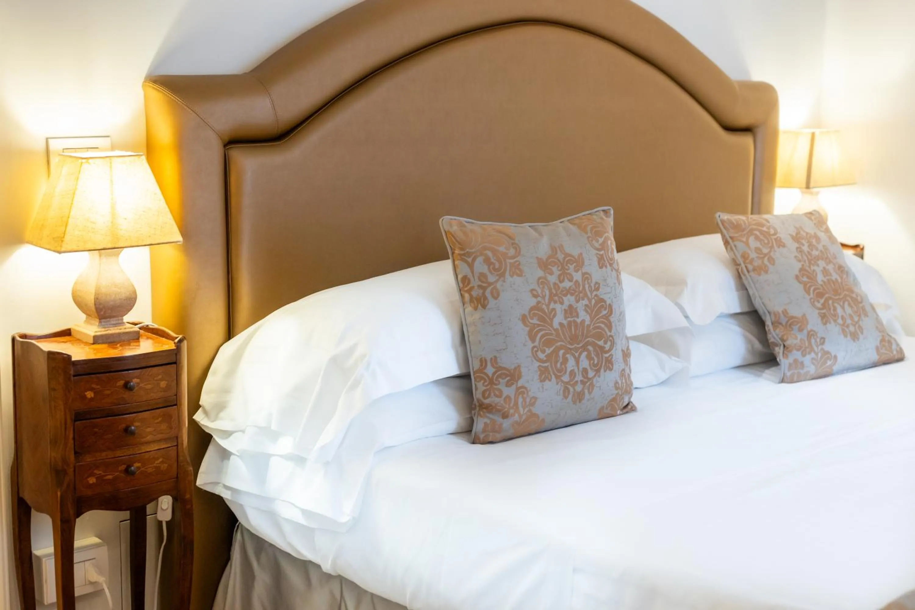 Bed in San Teodoro Palace - Luxury Apartments