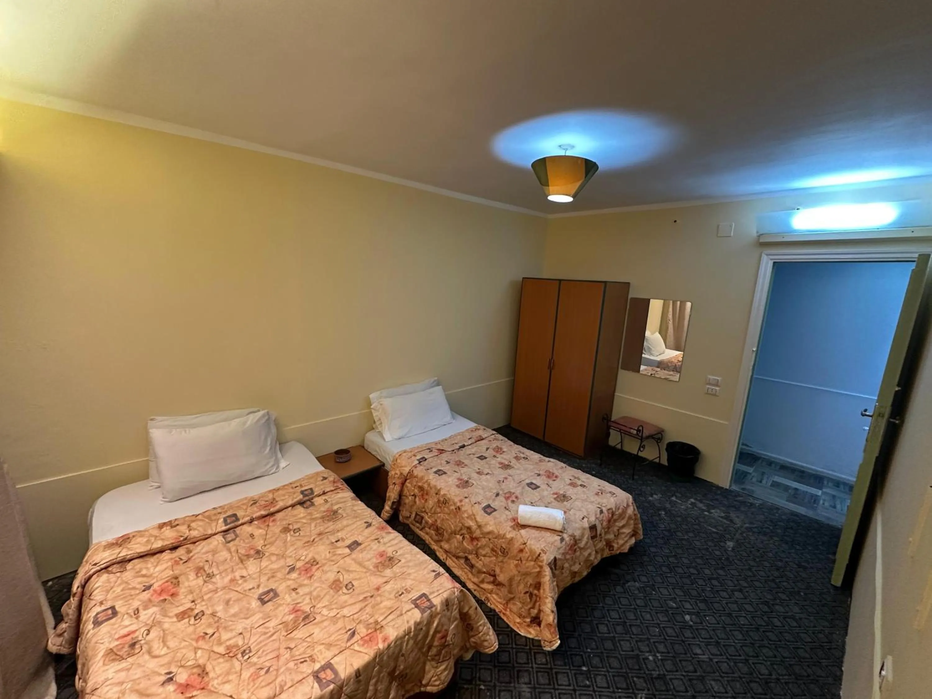 Bed in Arabesque Hotel