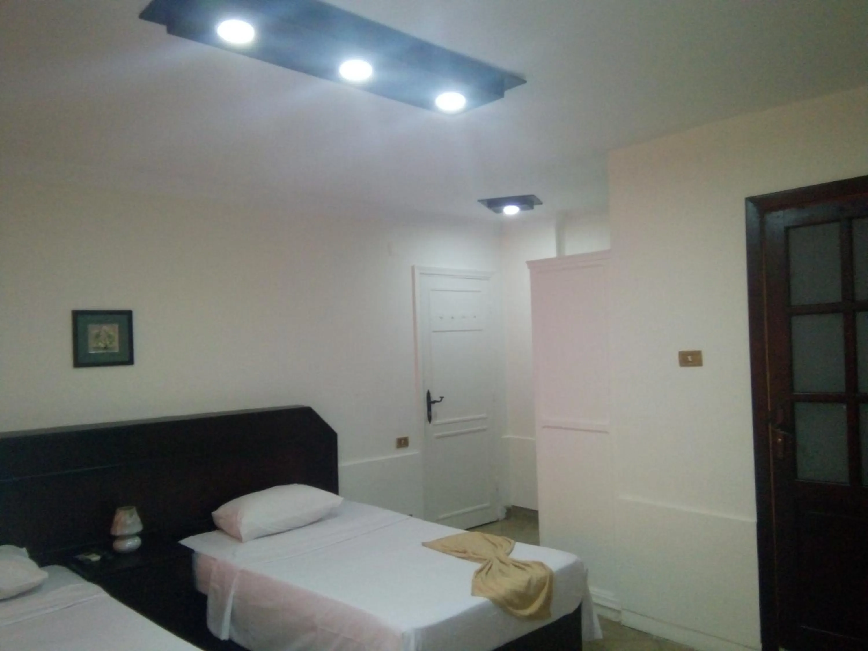 Bed in Arabesque Hotel