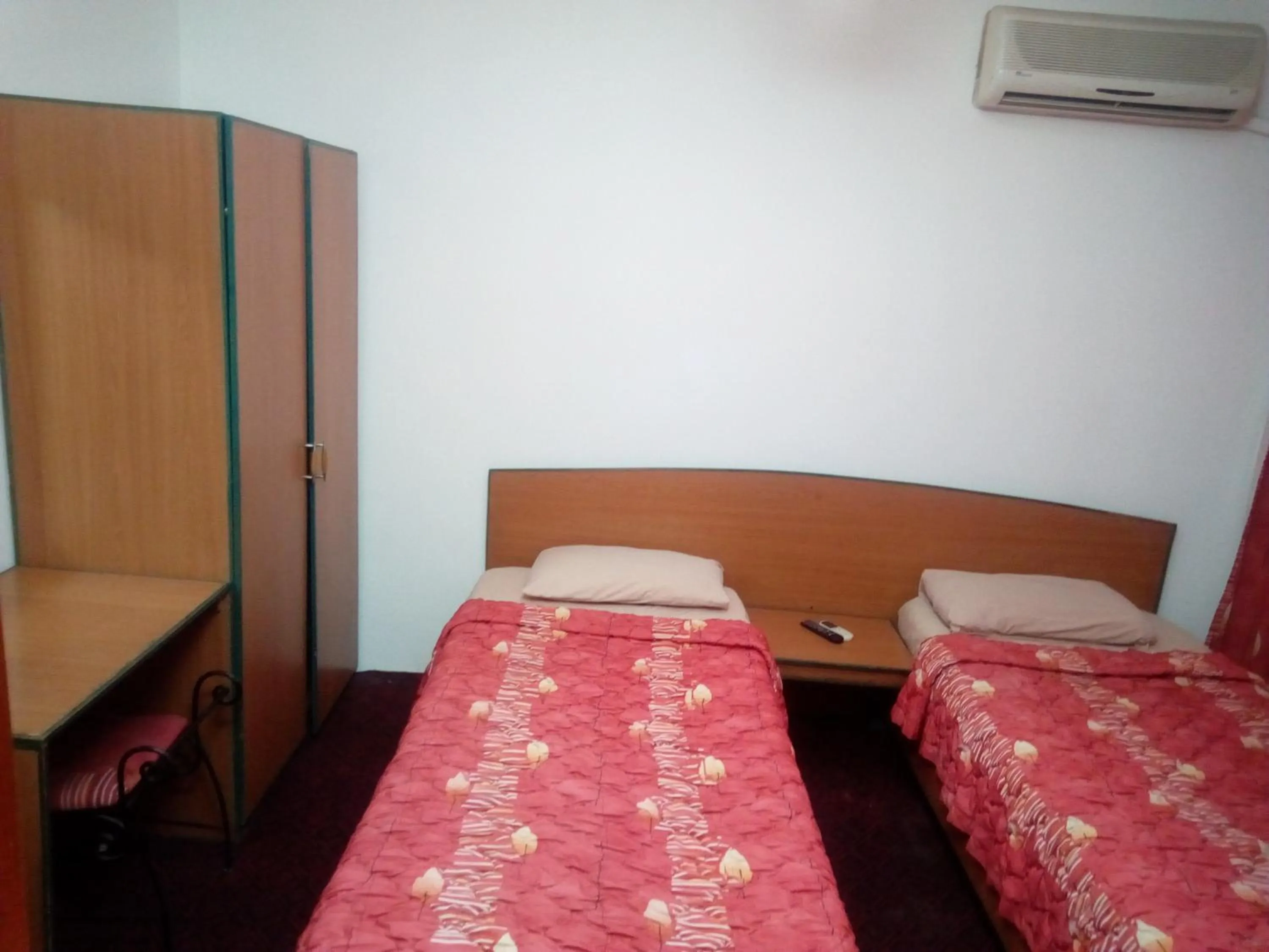 Bed in Arabesque Hotel