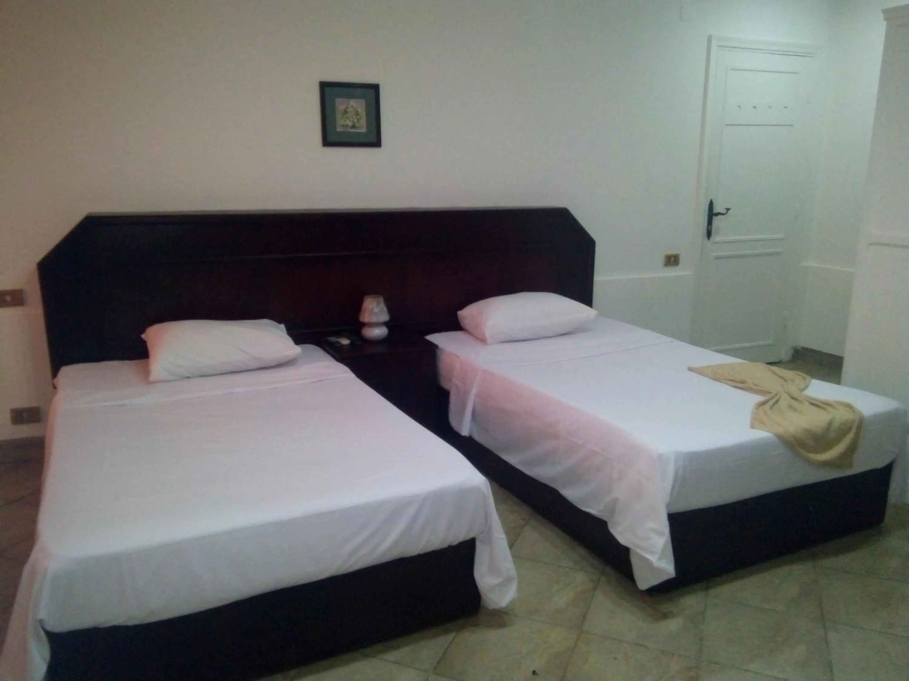 Bed in Arabesque Hotel