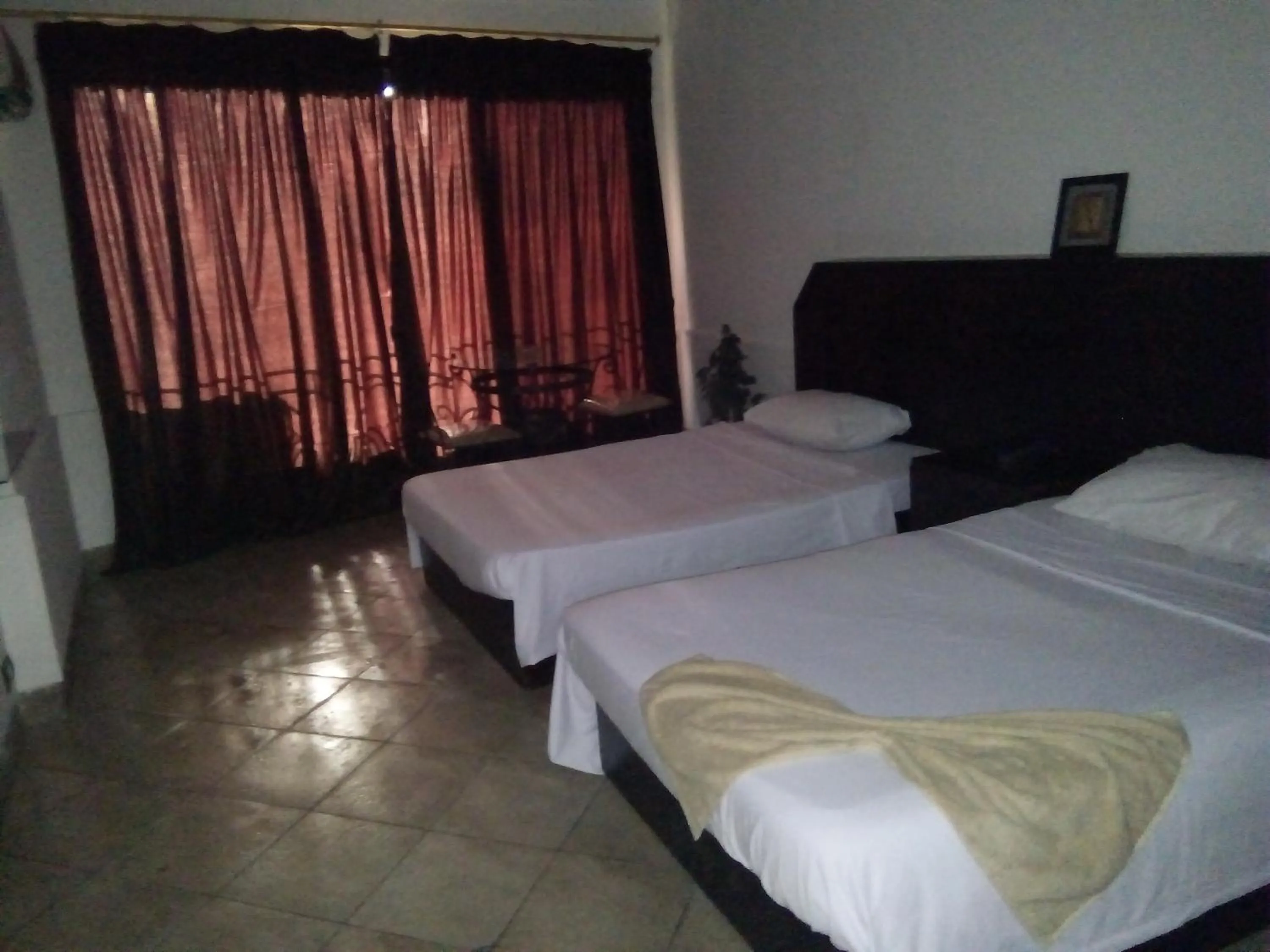 Bed in Arabesque Hotel