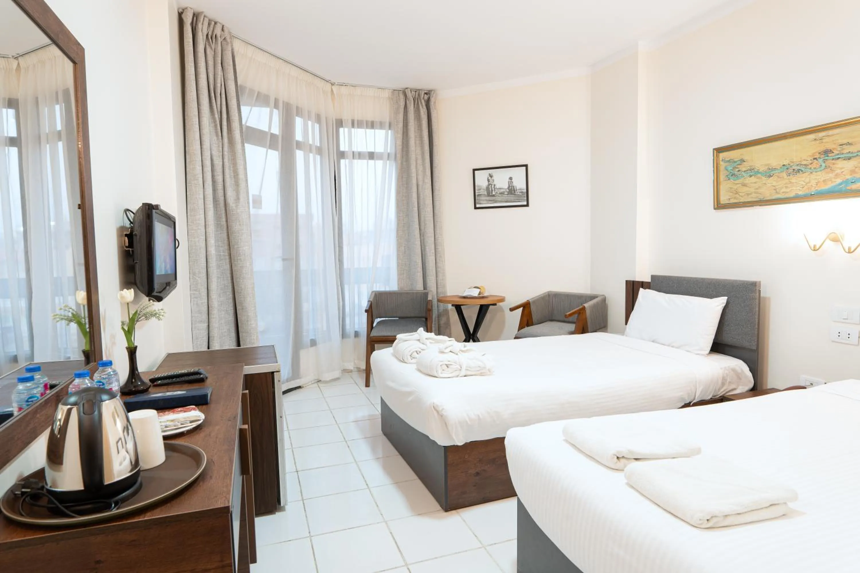 Bed in Gaddis Hotel, Suites and Apartments