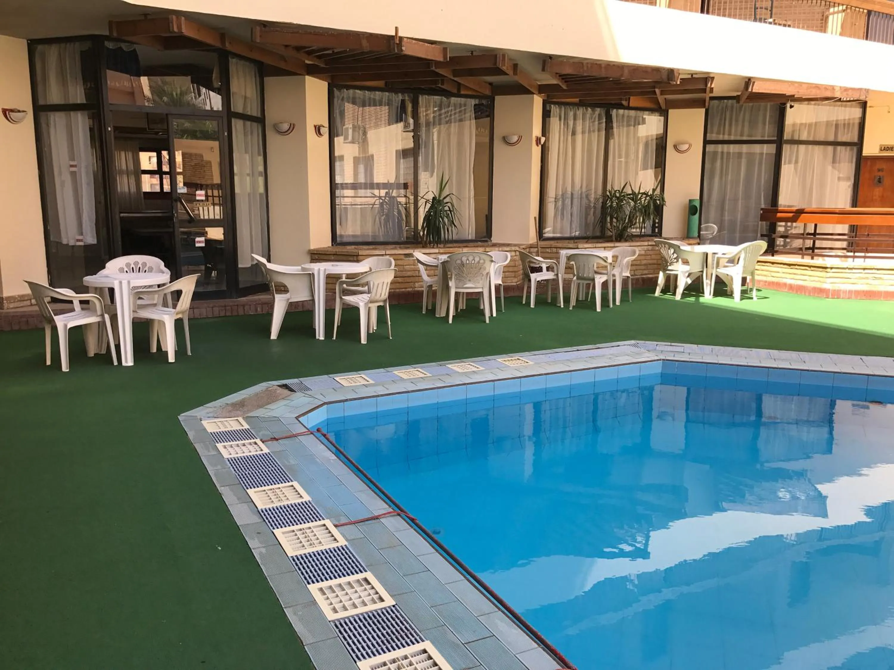 Swimming pool in Gaddis Hotel, Suites and Apartments