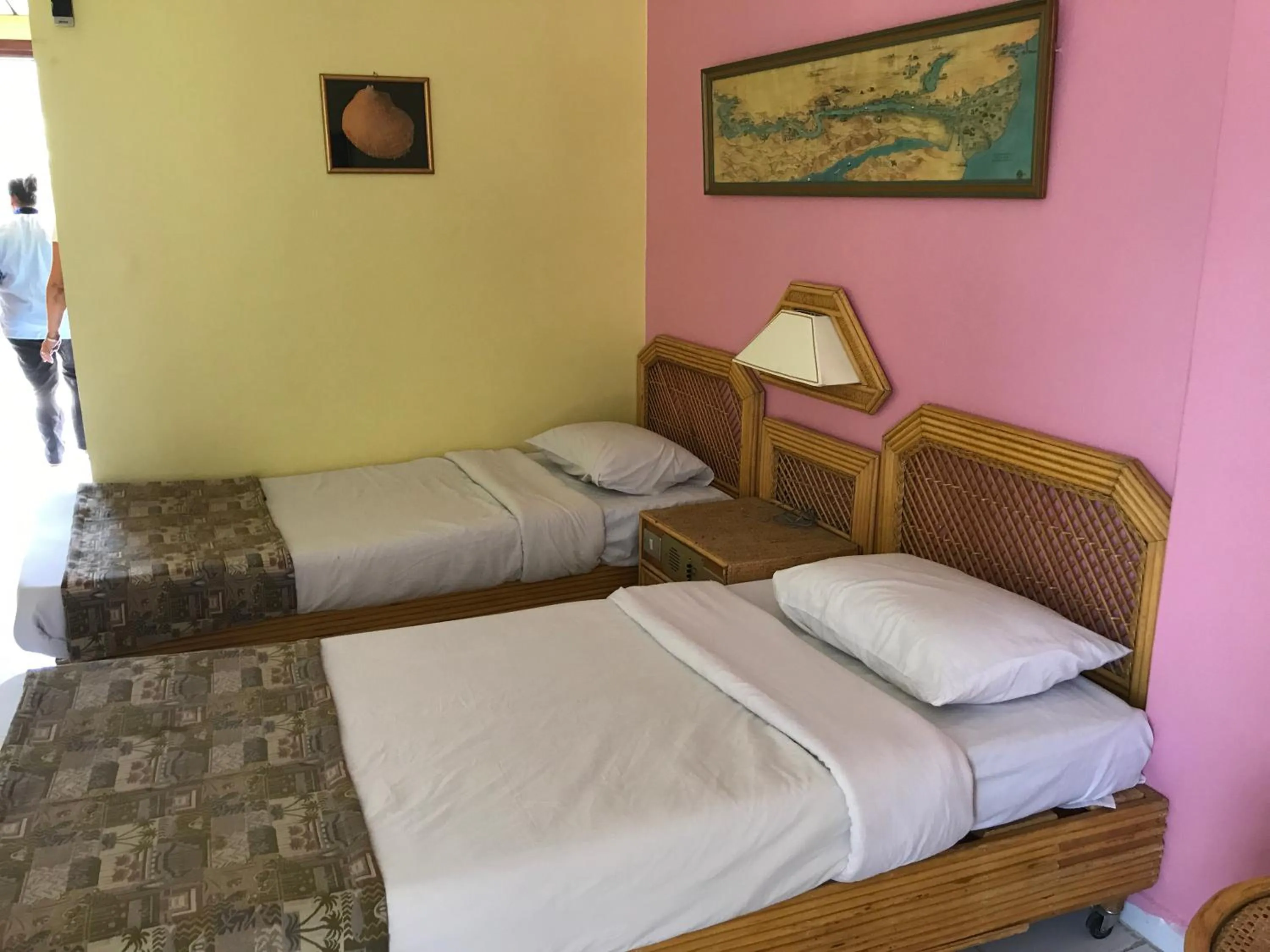 Bed in Gaddis Hotel, Suites and Apartments