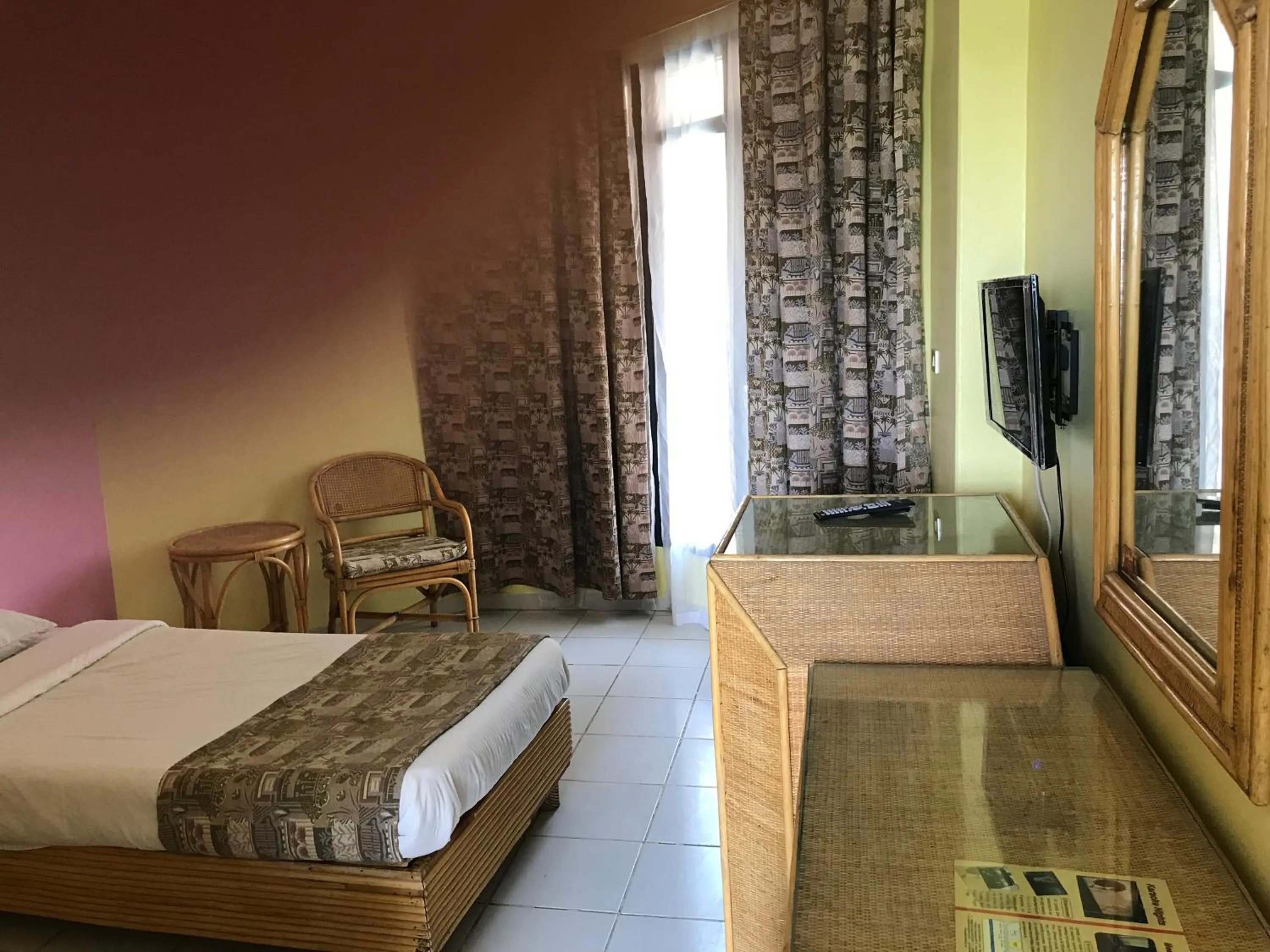 Bed in Gaddis Hotel, Suites and Apartments