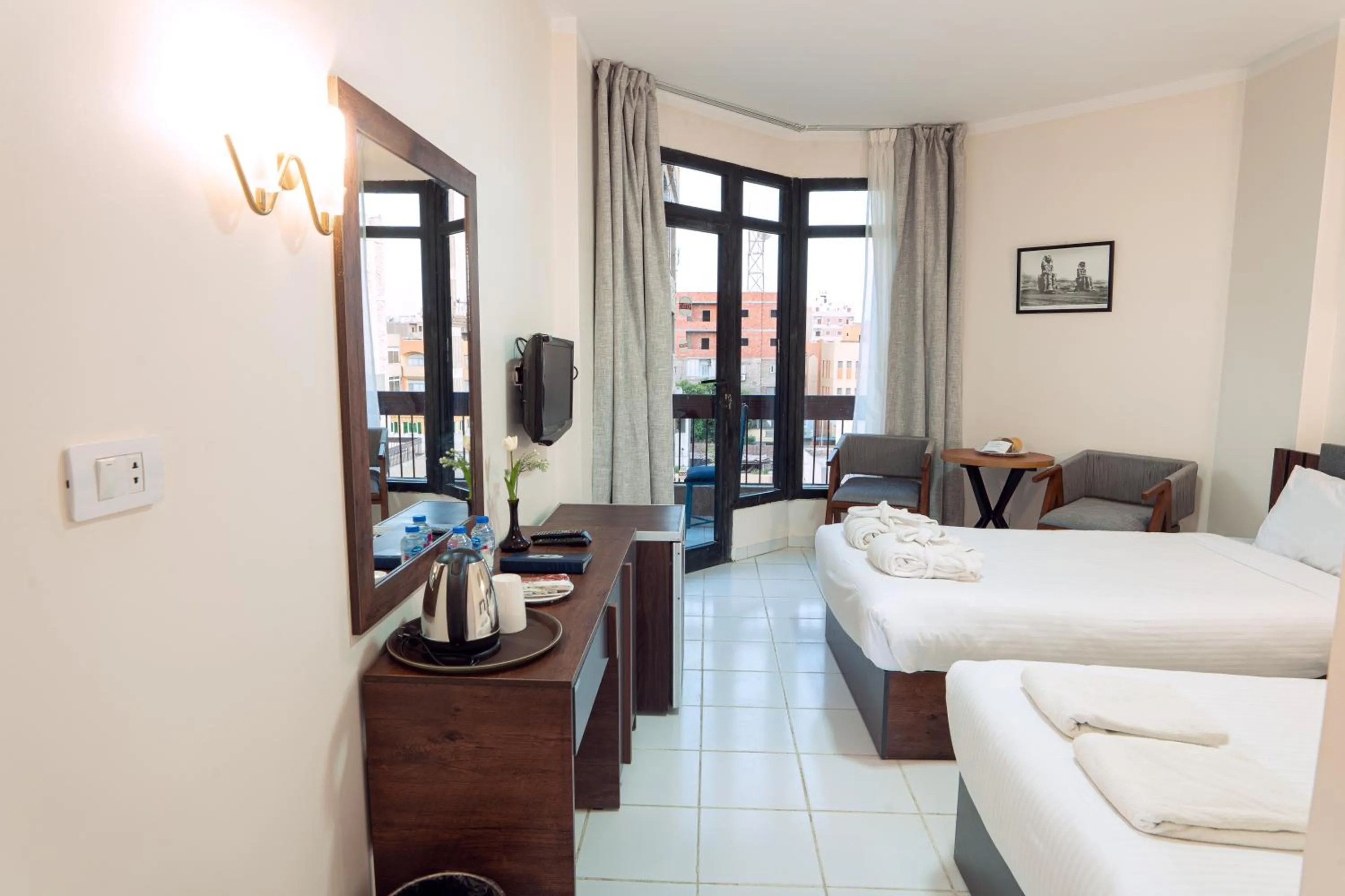 Bed in Gaddis Hotel, Suites and Apartments