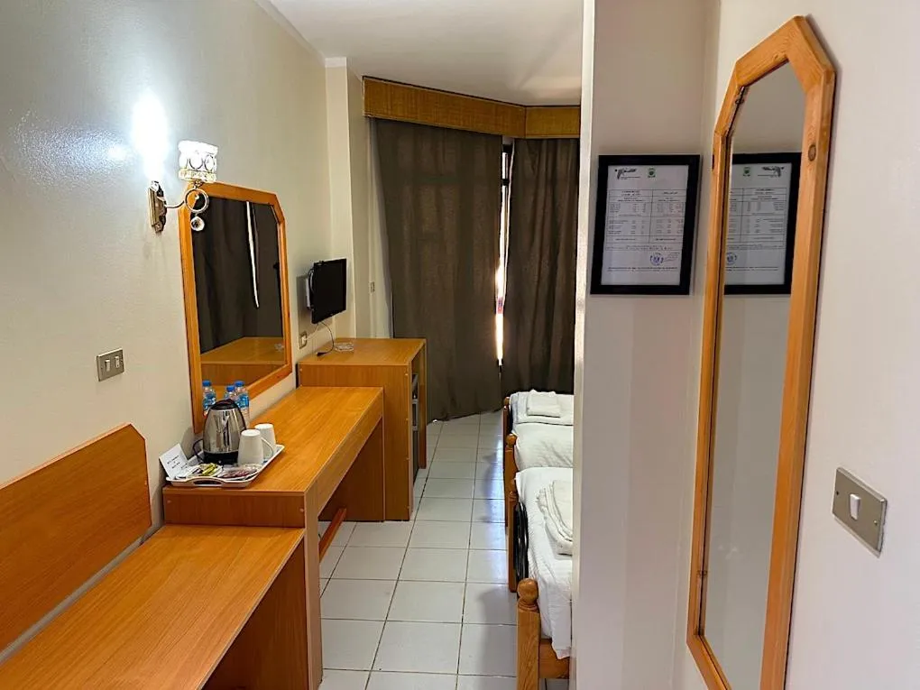 Bedroom in Gaddis Hotel, Suites and Apartments