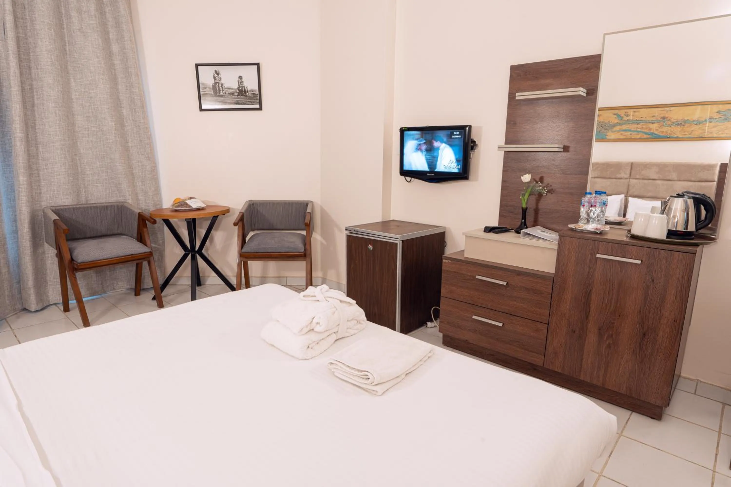 Bed in Gaddis Hotel, Suites and Apartments