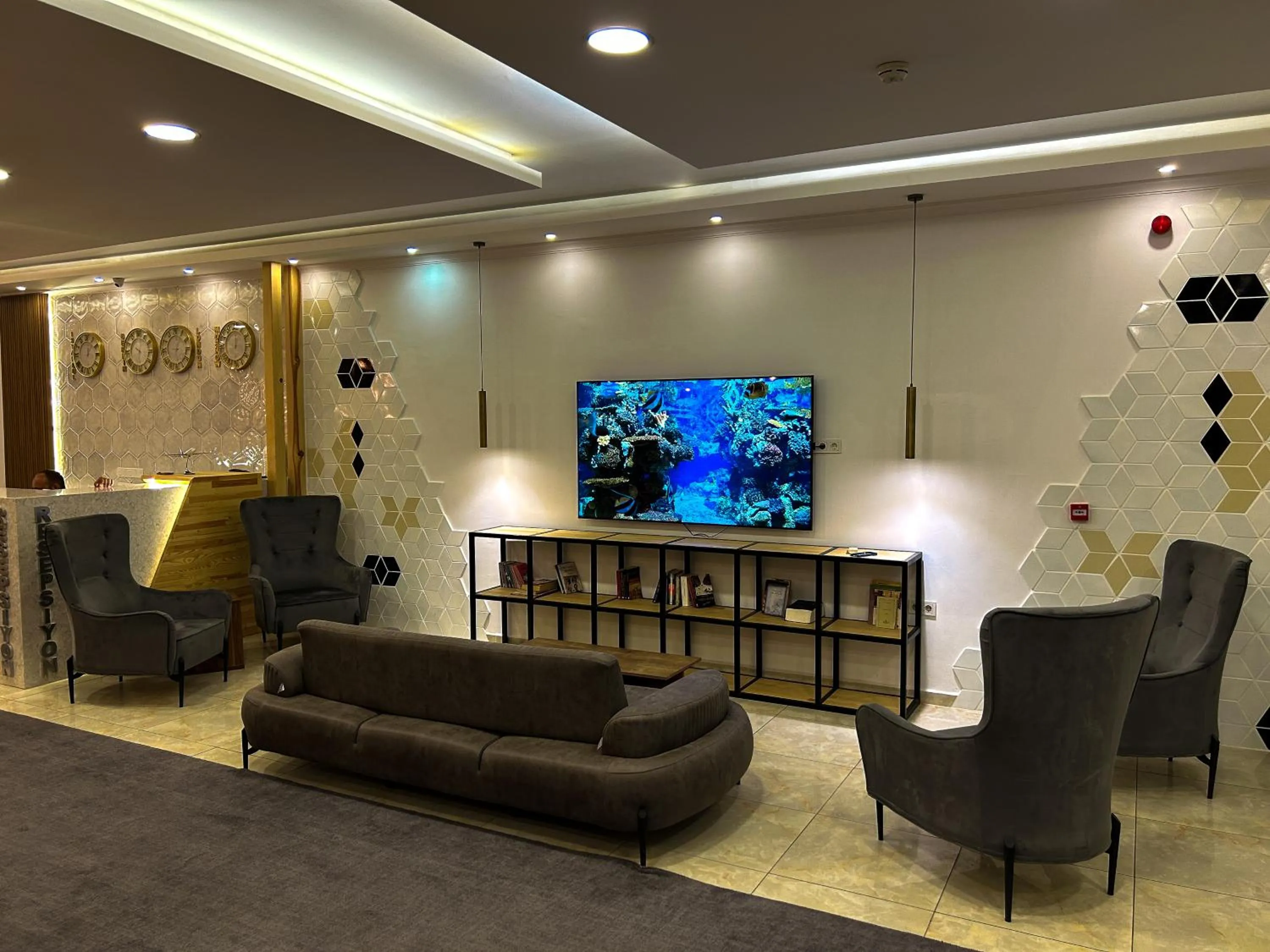 Communal lounge/ TV room in Gulluk Life Hotel