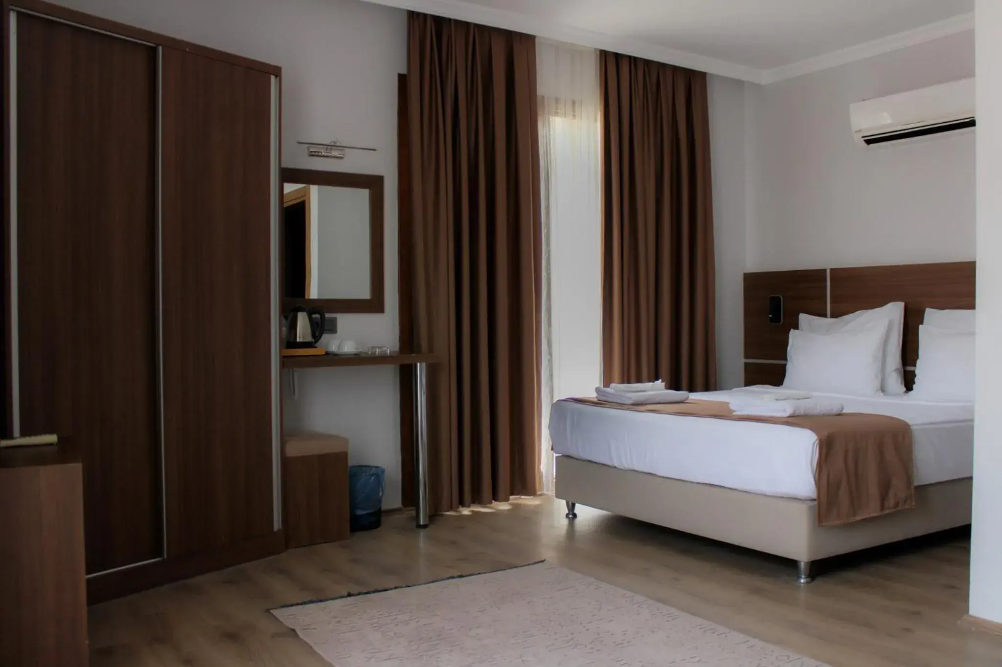 Deluxe Room (2 Adults + 1 Child) in Gulluk Life Hotel Deluxe Room (2 Adults + 1 Child) in Gulluk Life Hotel