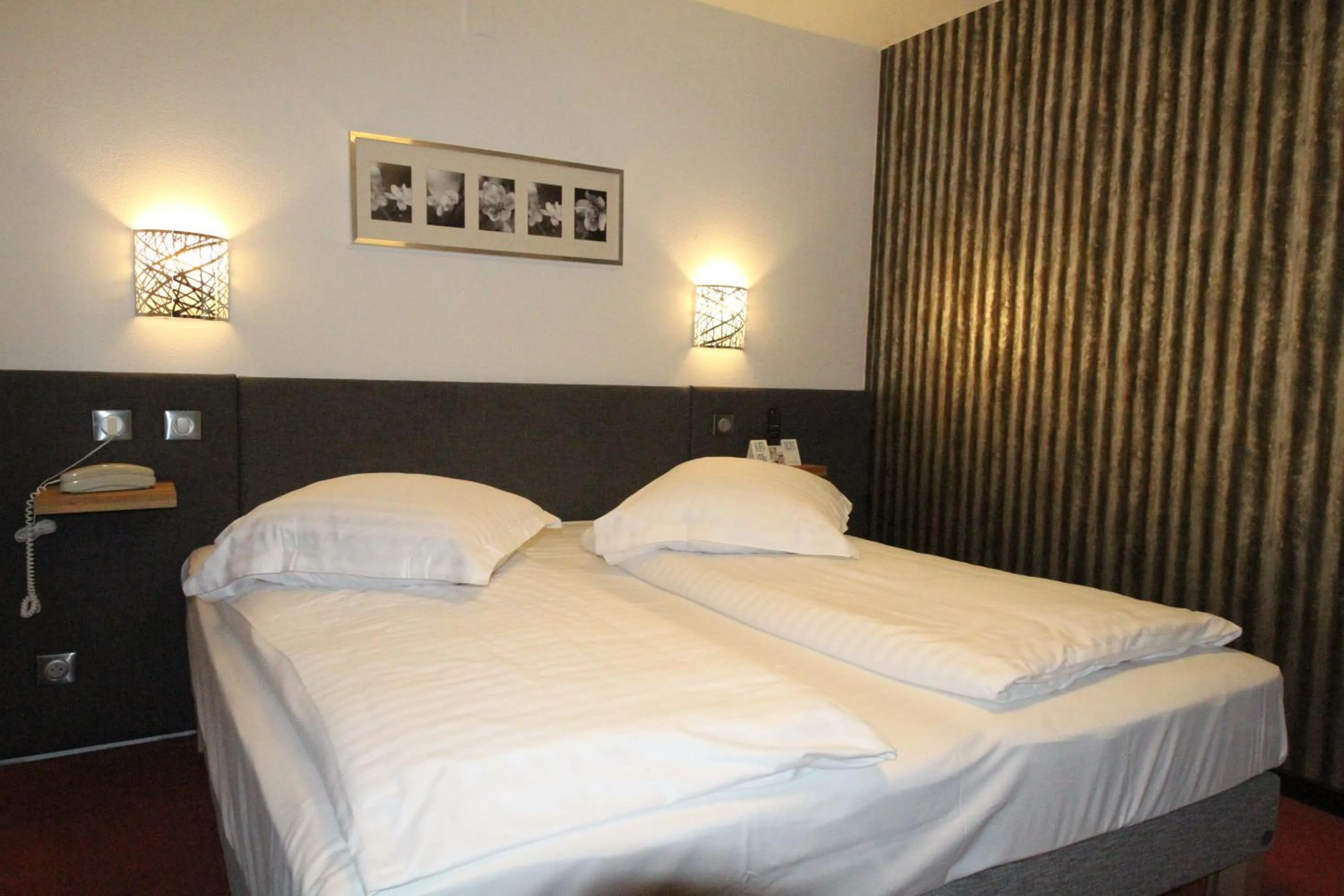 Bed in Hôtel Le Verger De Bischwiller