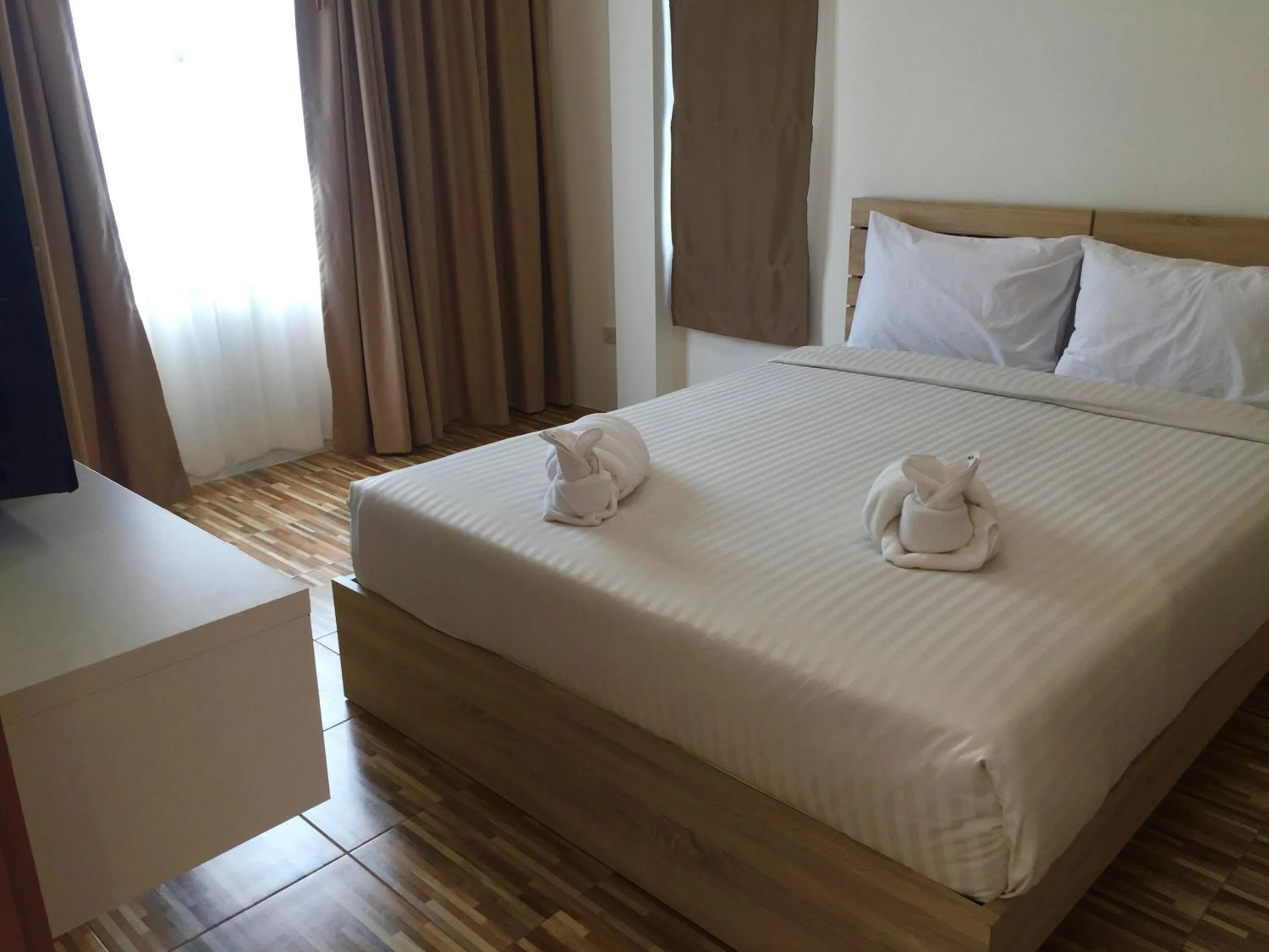 Bed in Mondara Vacation Home