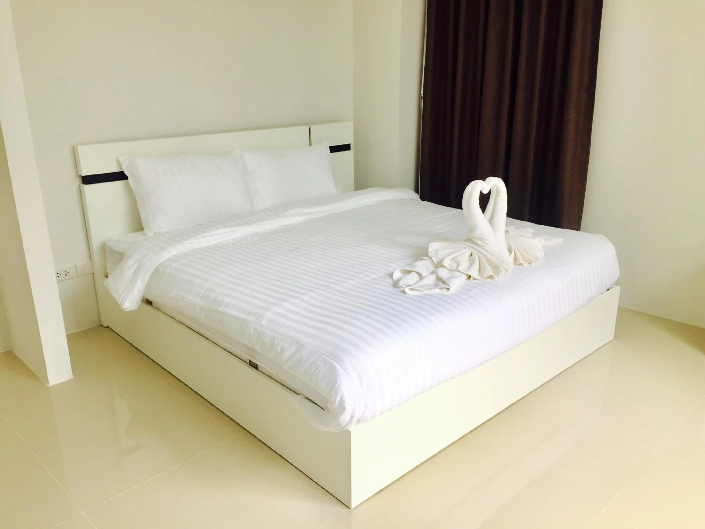 Bed in Mondara Vacation Home