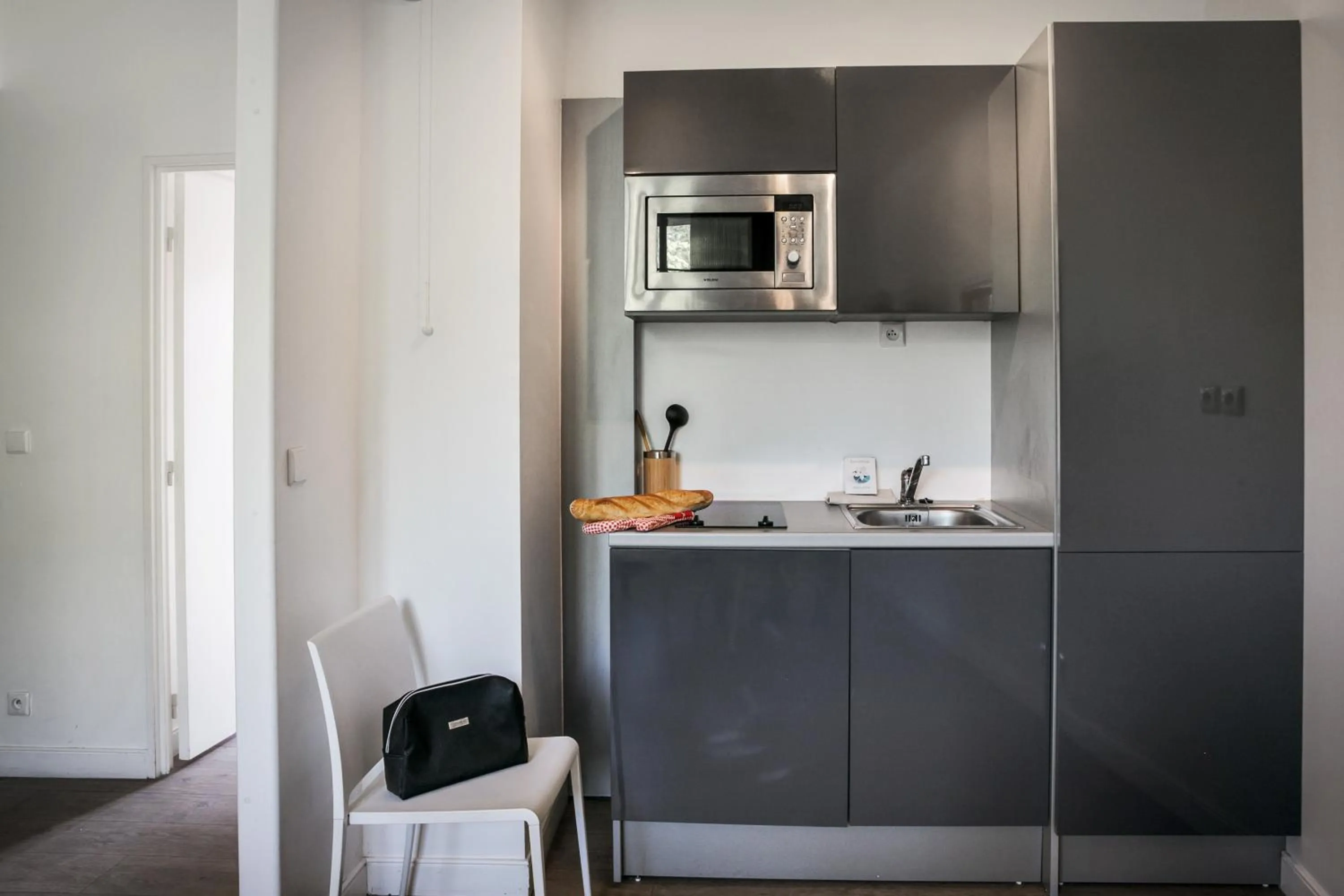 Kitchen or kitchenette in Comfort Aparthotel Lourdes Lorda