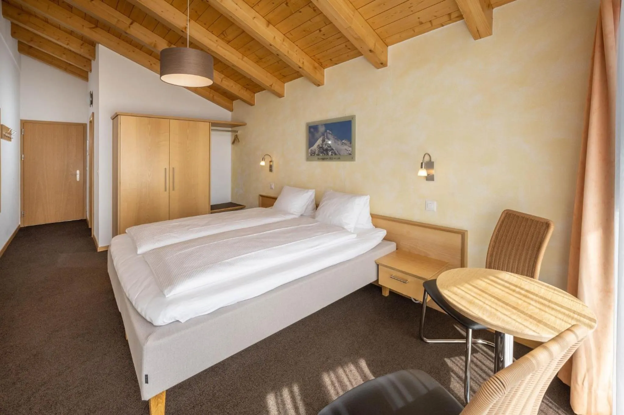 Photo of the whole room, Bed in Aktiv Hotel & Spa Hannigalp