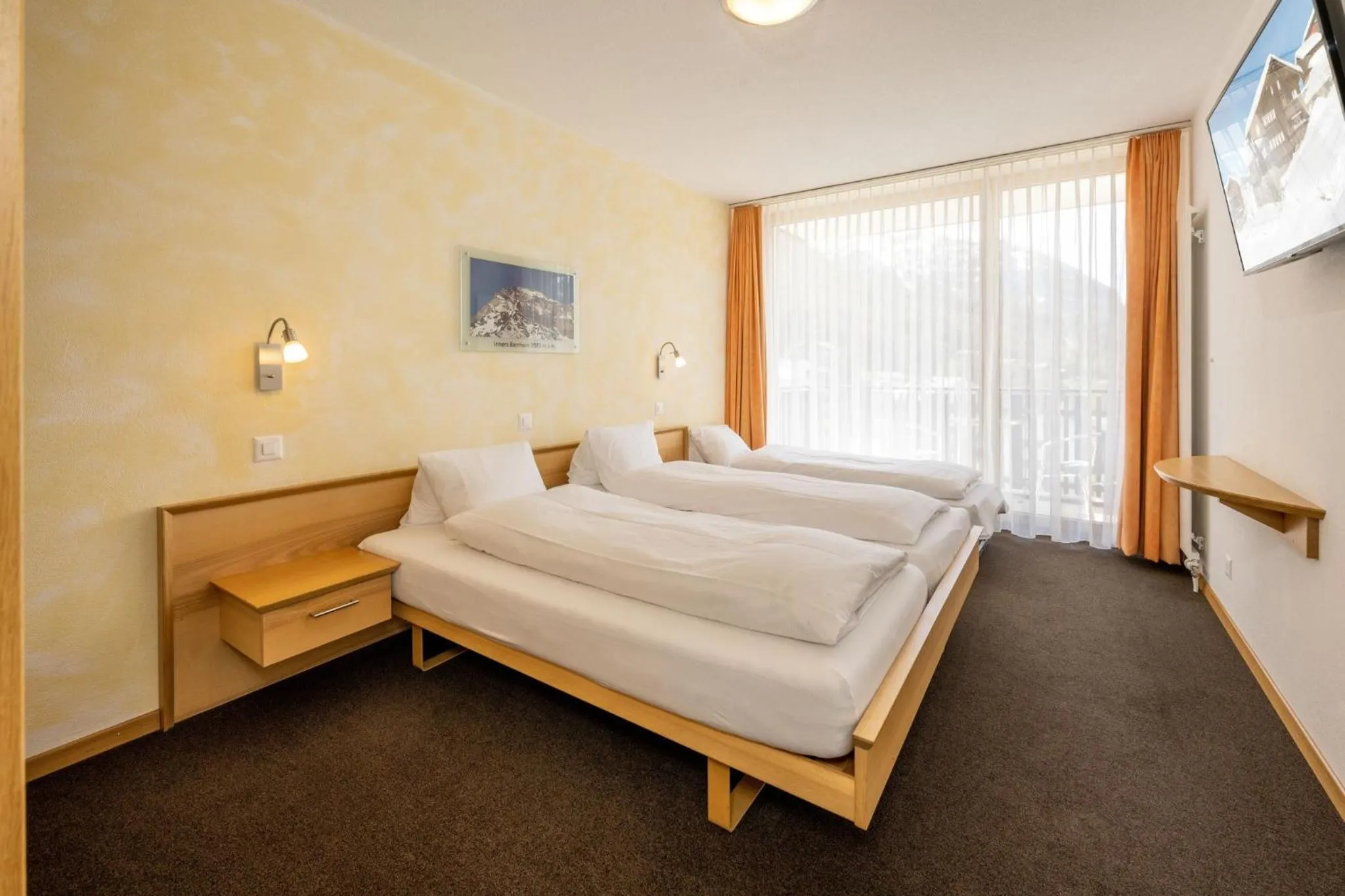 Photo of the whole room, Bed in Aktiv Hotel & Spa Hannigalp