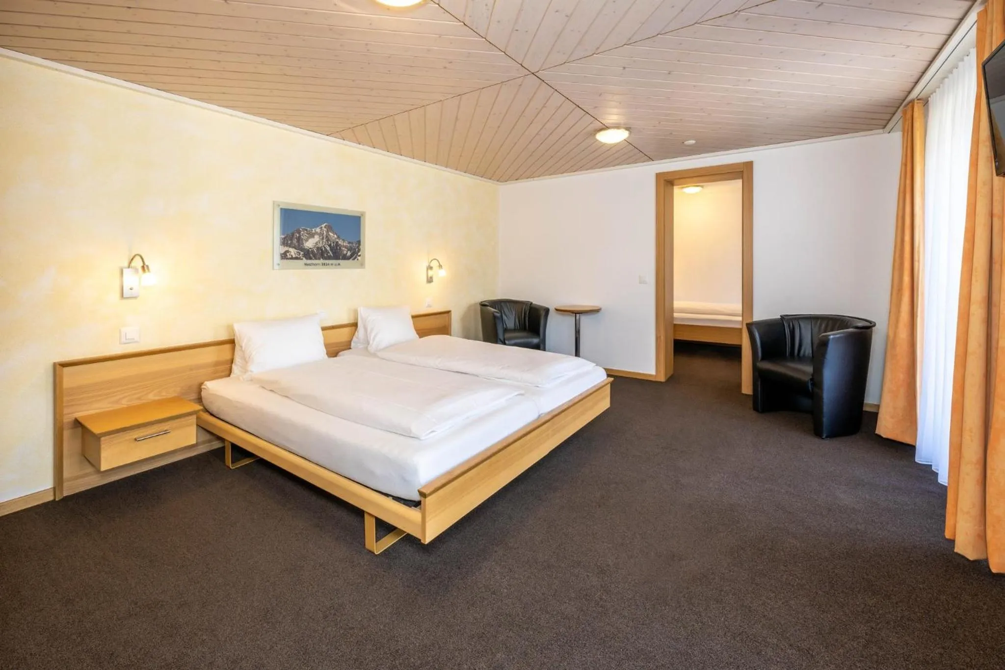 Photo of the whole room, Bed in Aktiv Hotel & Spa Hannigalp