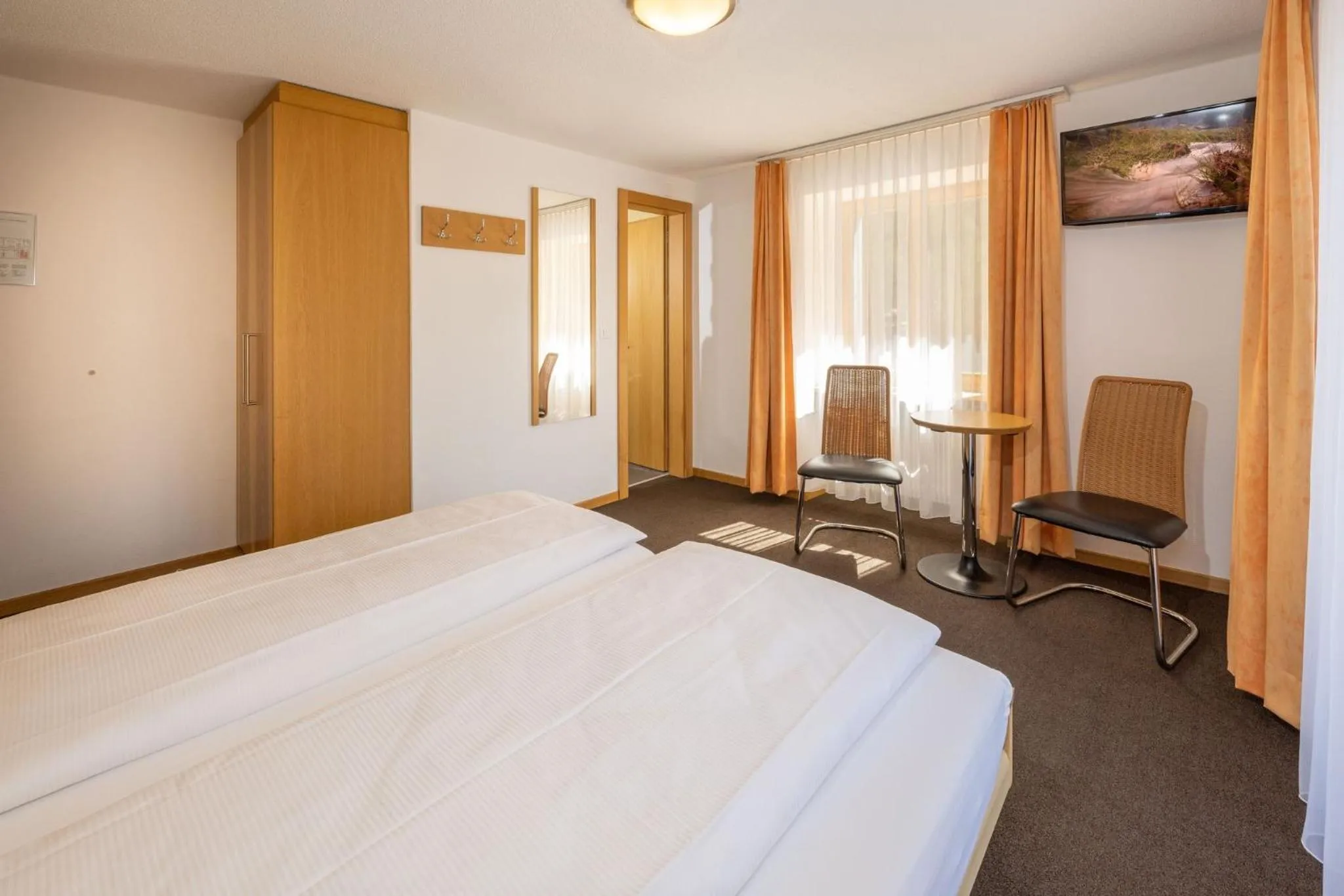 Photo of the whole room, Bed in Aktiv Hotel & Spa Hannigalp