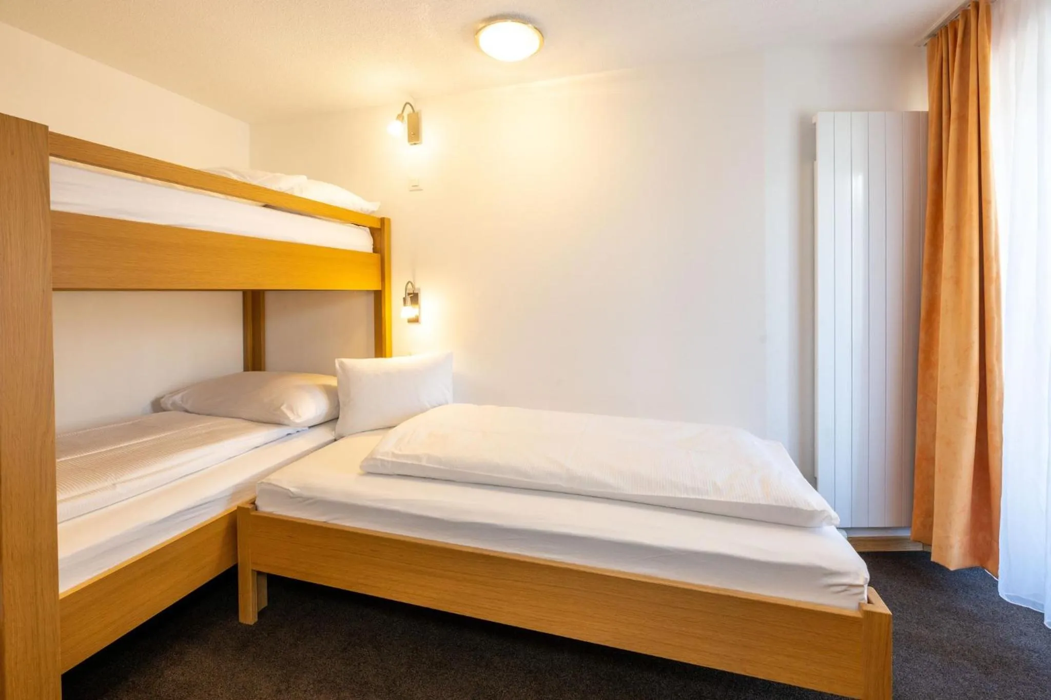 Photo of the whole room, Bed in Aktiv Hotel & Spa Hannigalp