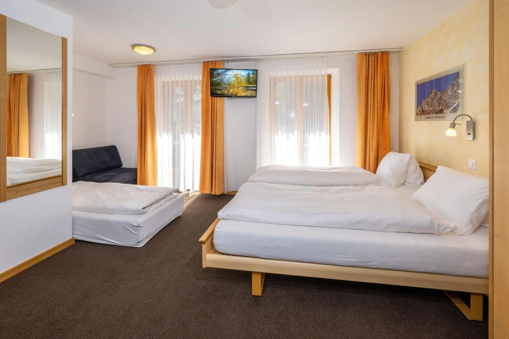 Photo of the whole room, Bed in Aktiv Hotel & Spa Hannigalp