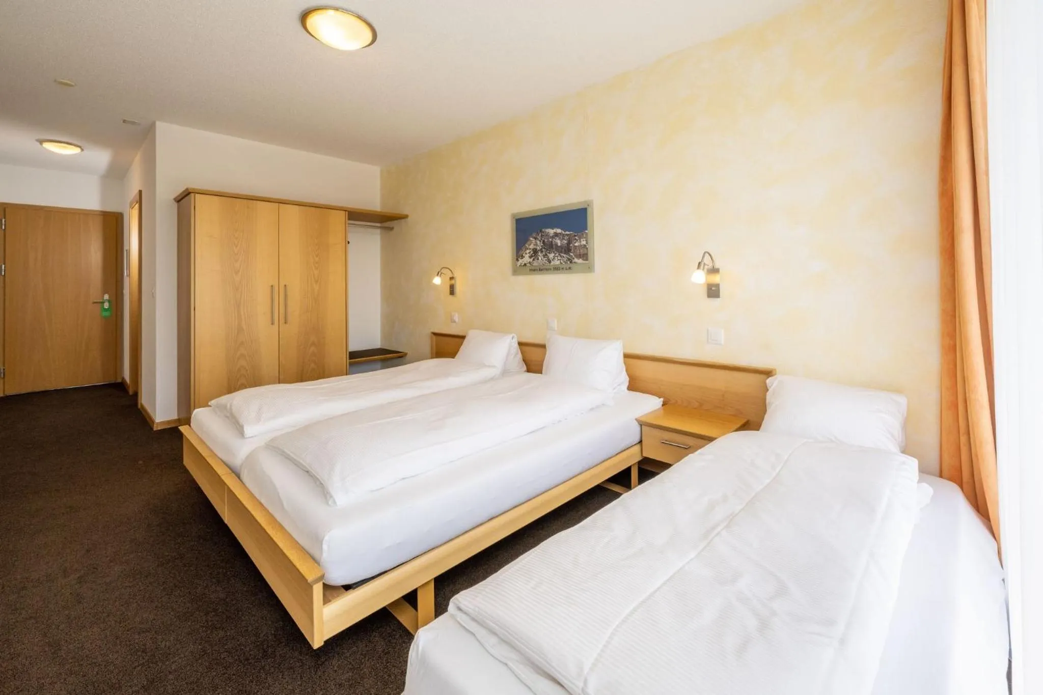 Photo of the whole room, Bed in Aktiv Hotel & Spa Hannigalp