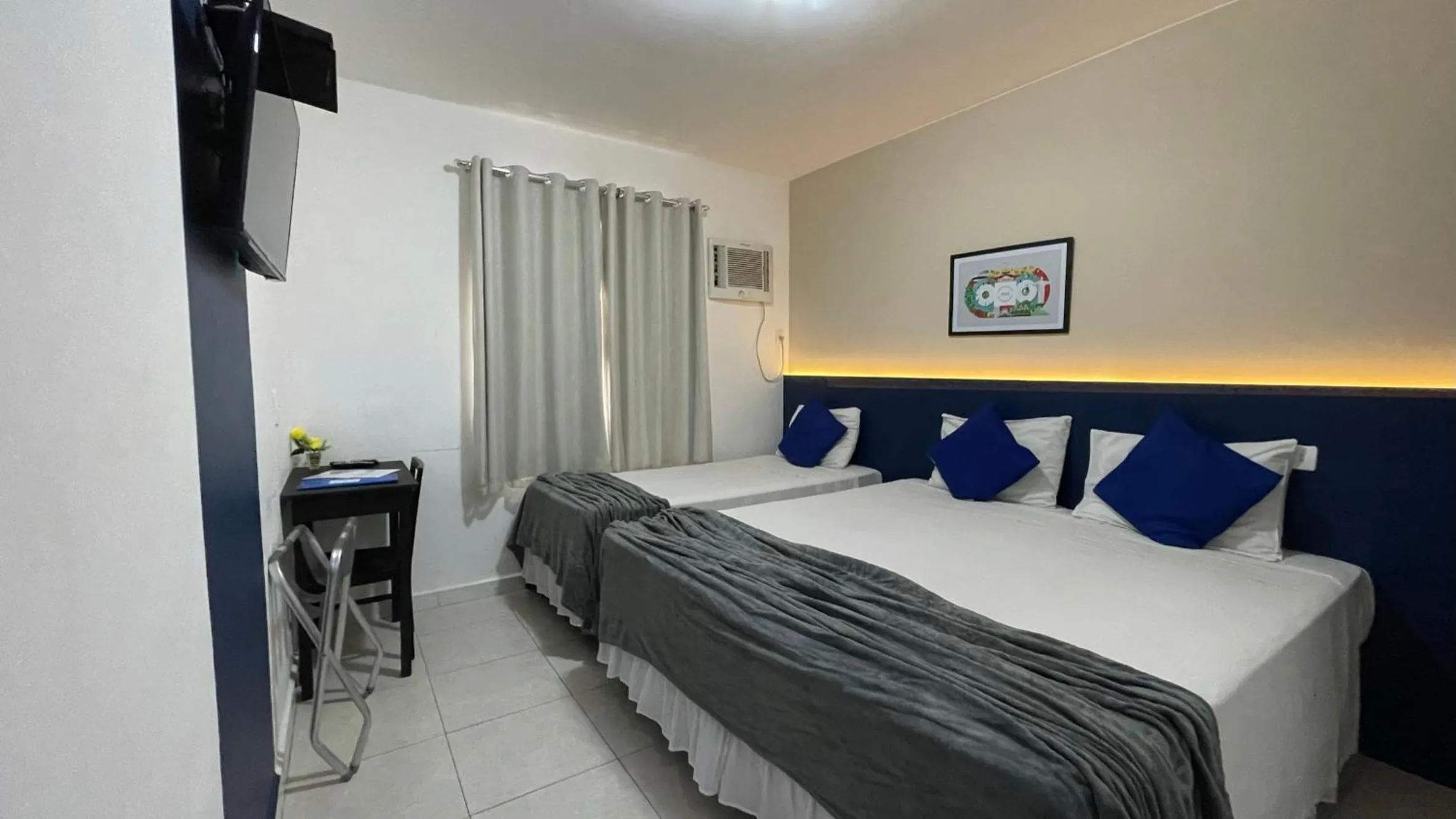 Bed in Copacabana Blue Hotel