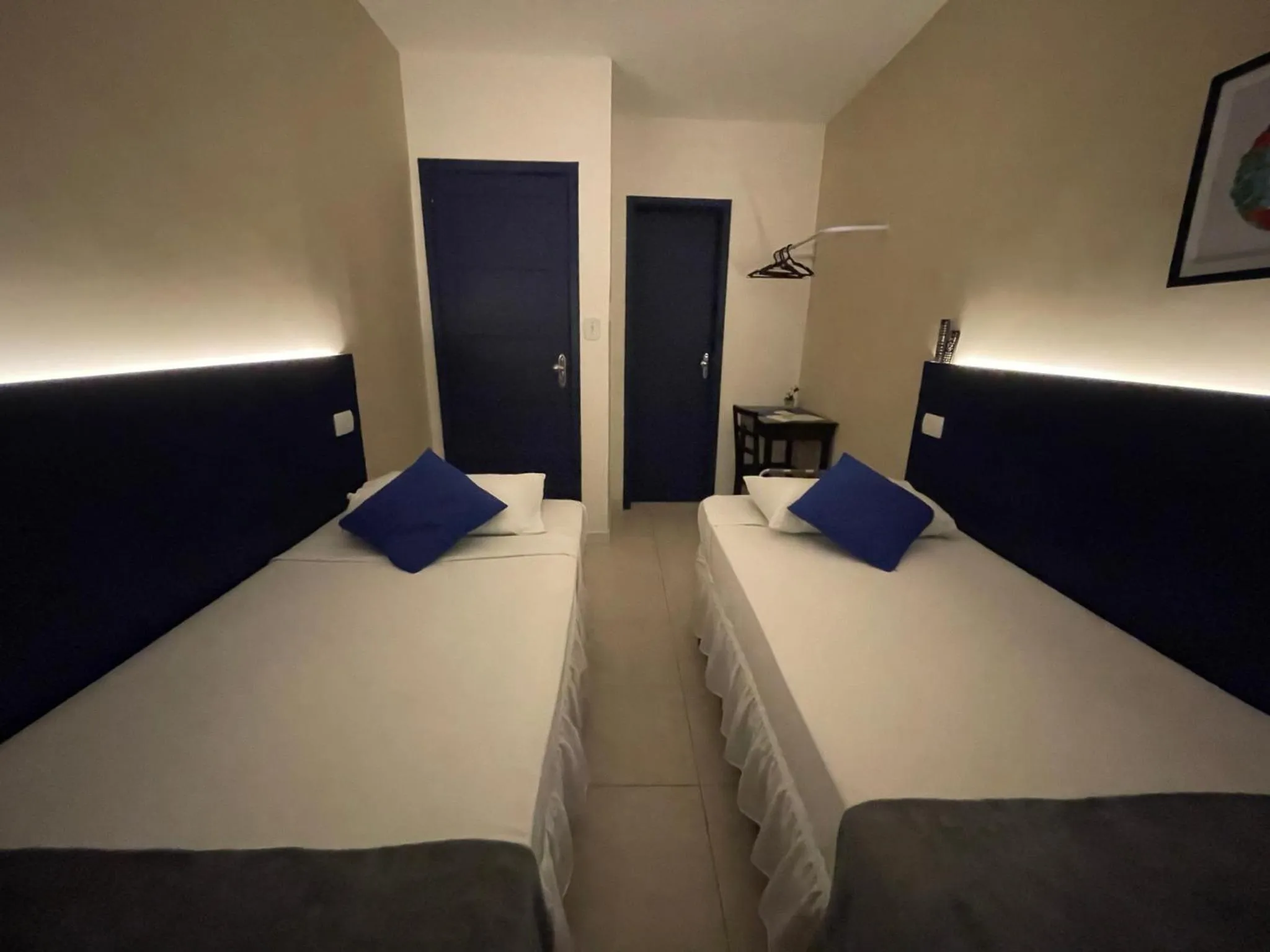 Bed in Copacabana Blue Hotel