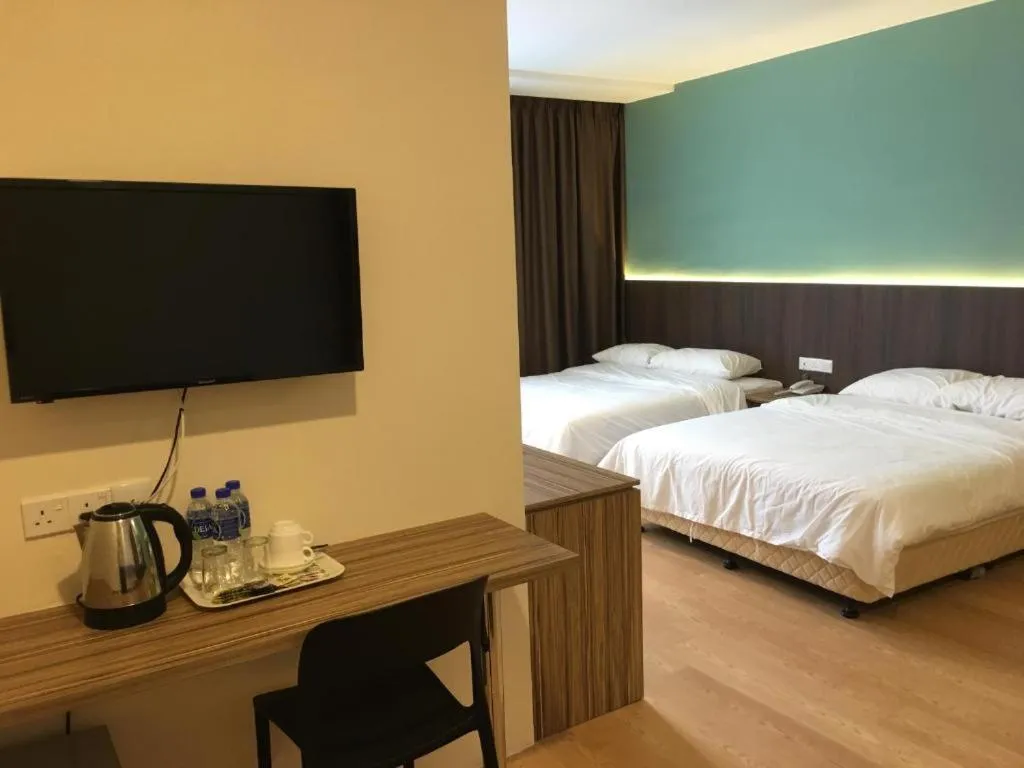 Bed in Tumike Hotel Bentong