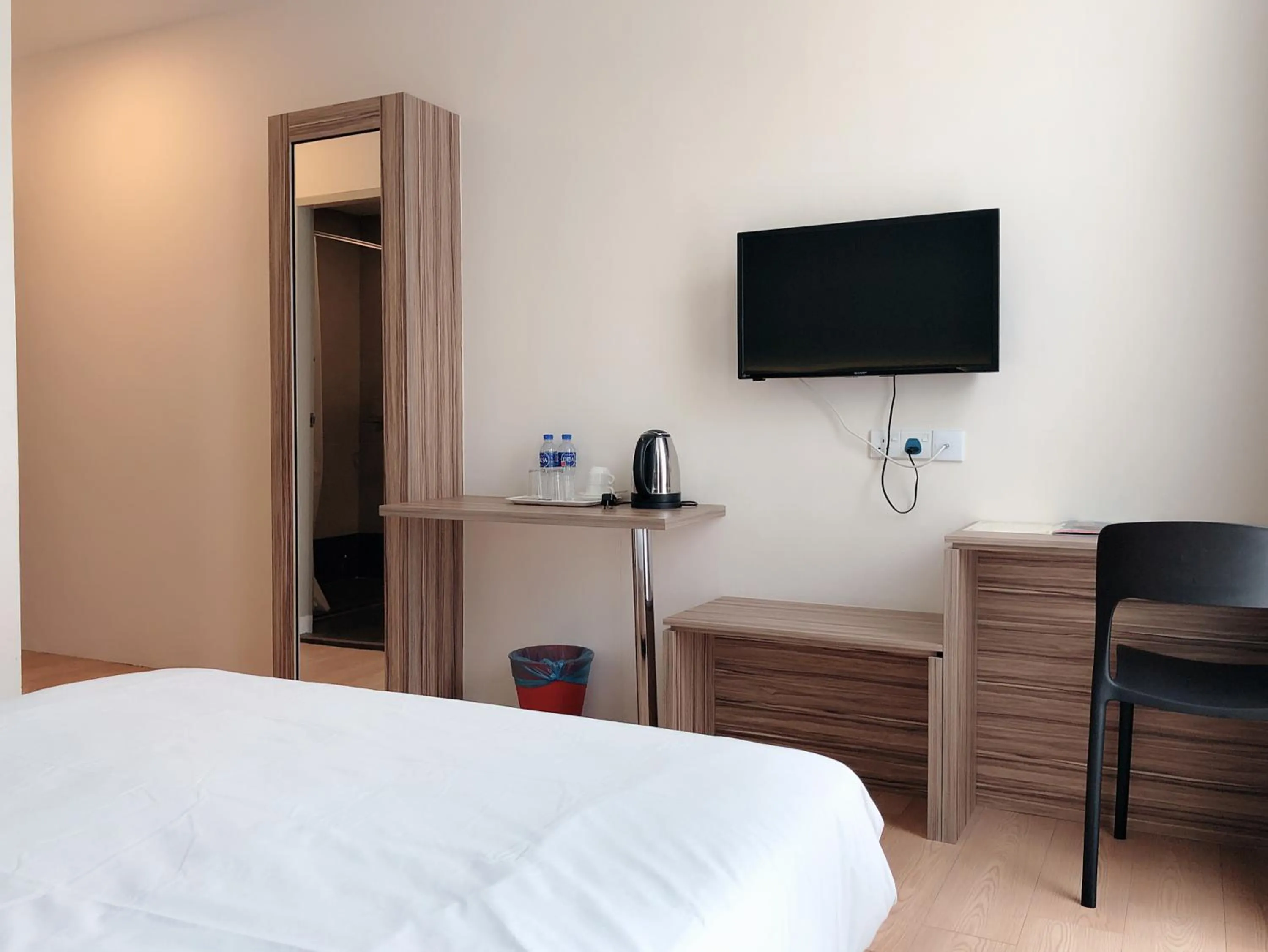 Bed in Tumike Hotel Bentong