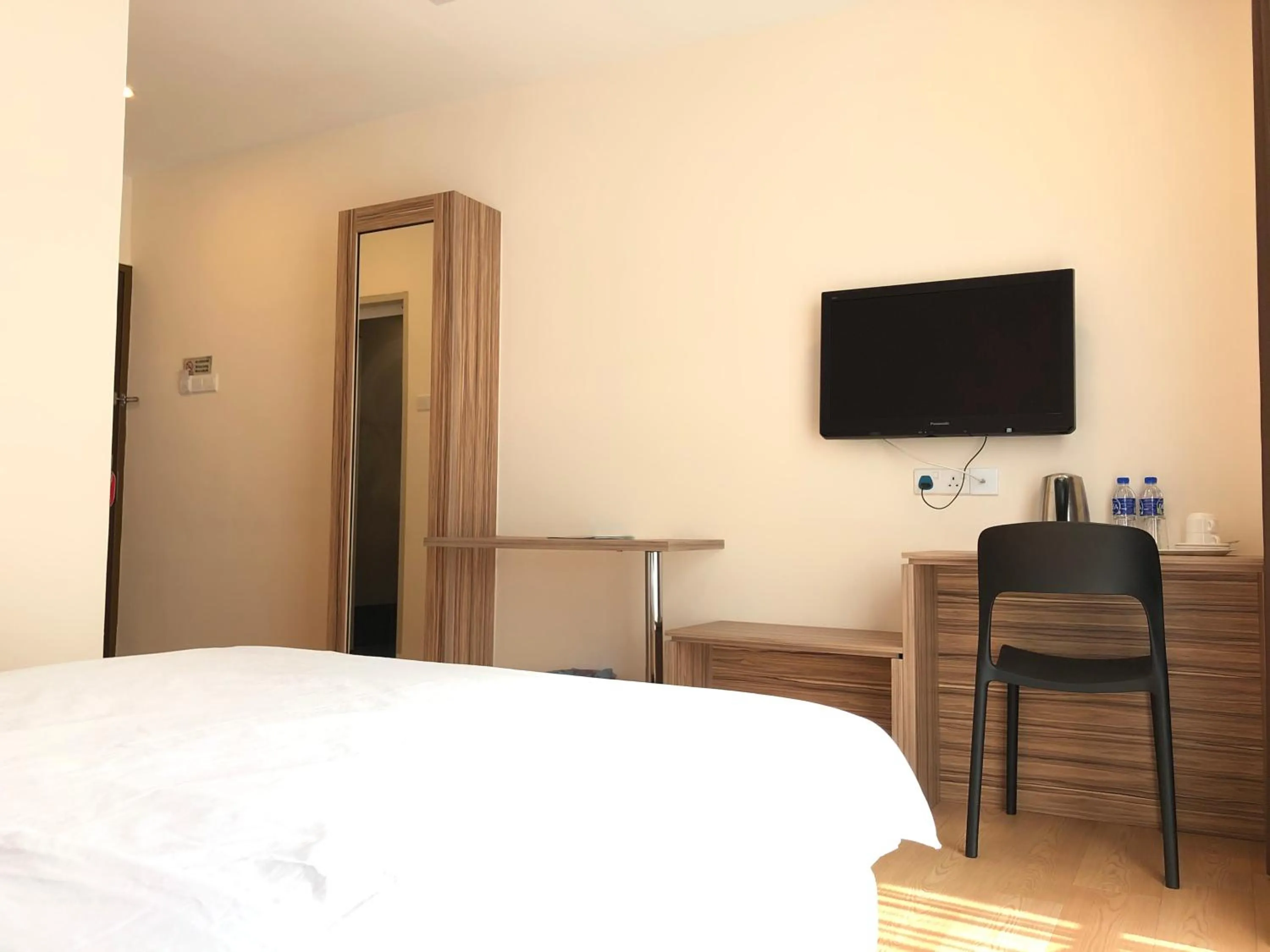 Bed in Tumike Hotel Bentong