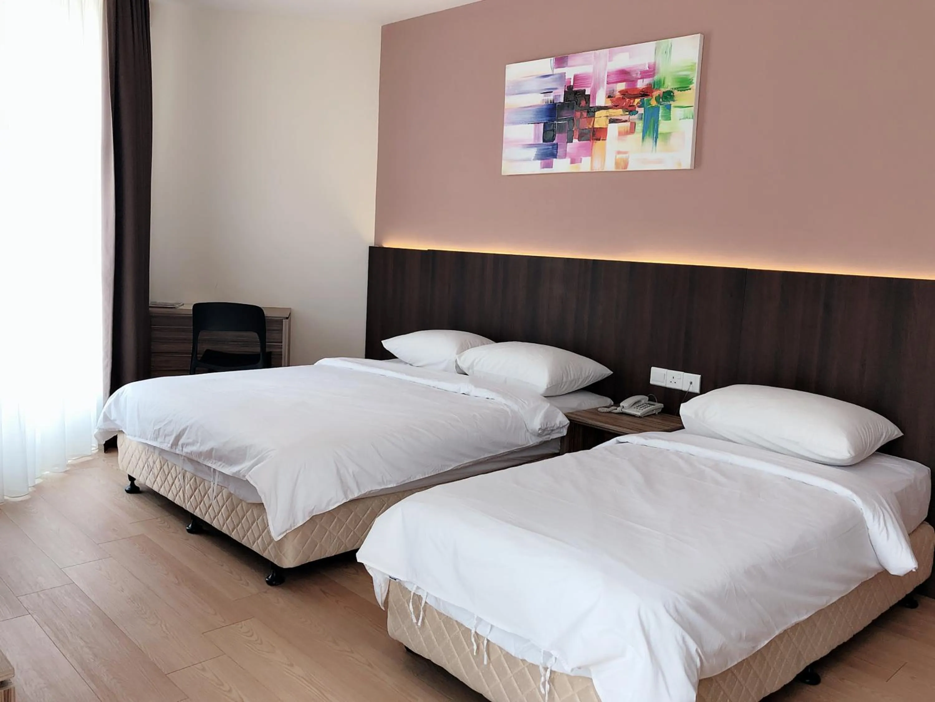 Bed in Tumike Hotel Bentong