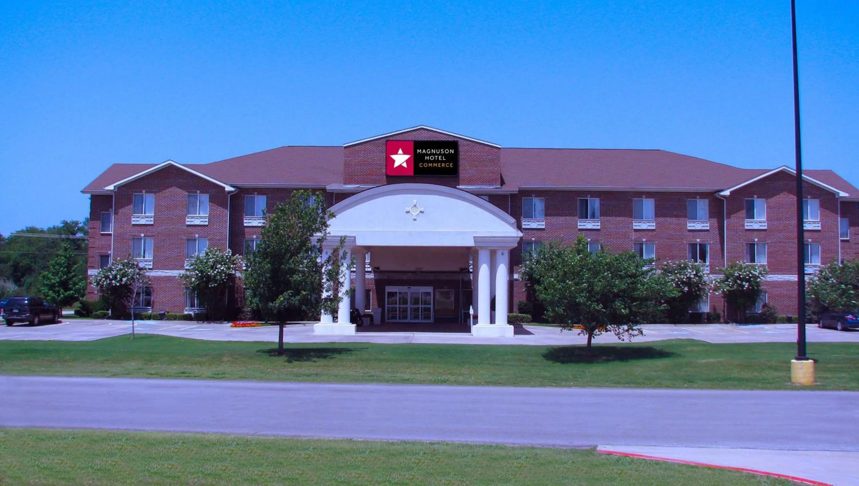 Property building in Magnuson Hotel Commerce